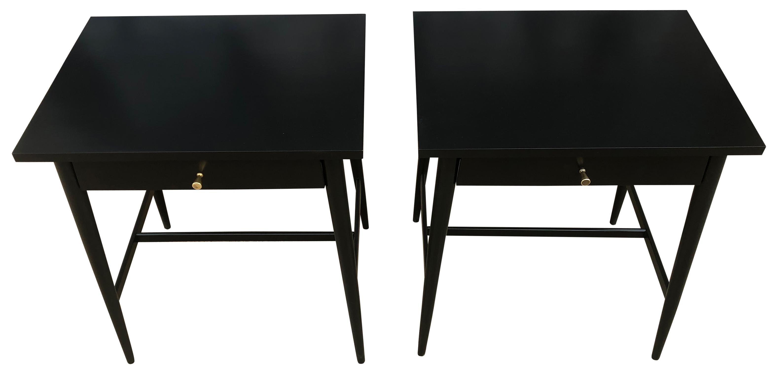 Beautiful pair of Paul McCobb Planner Group #1586 maple nightstands lamp tables single drawer Planner Group brass knobs Minimalist refinished in black lacquer - Professionally sprayed. Very delicate designed pair of nightstands with tapered legs -