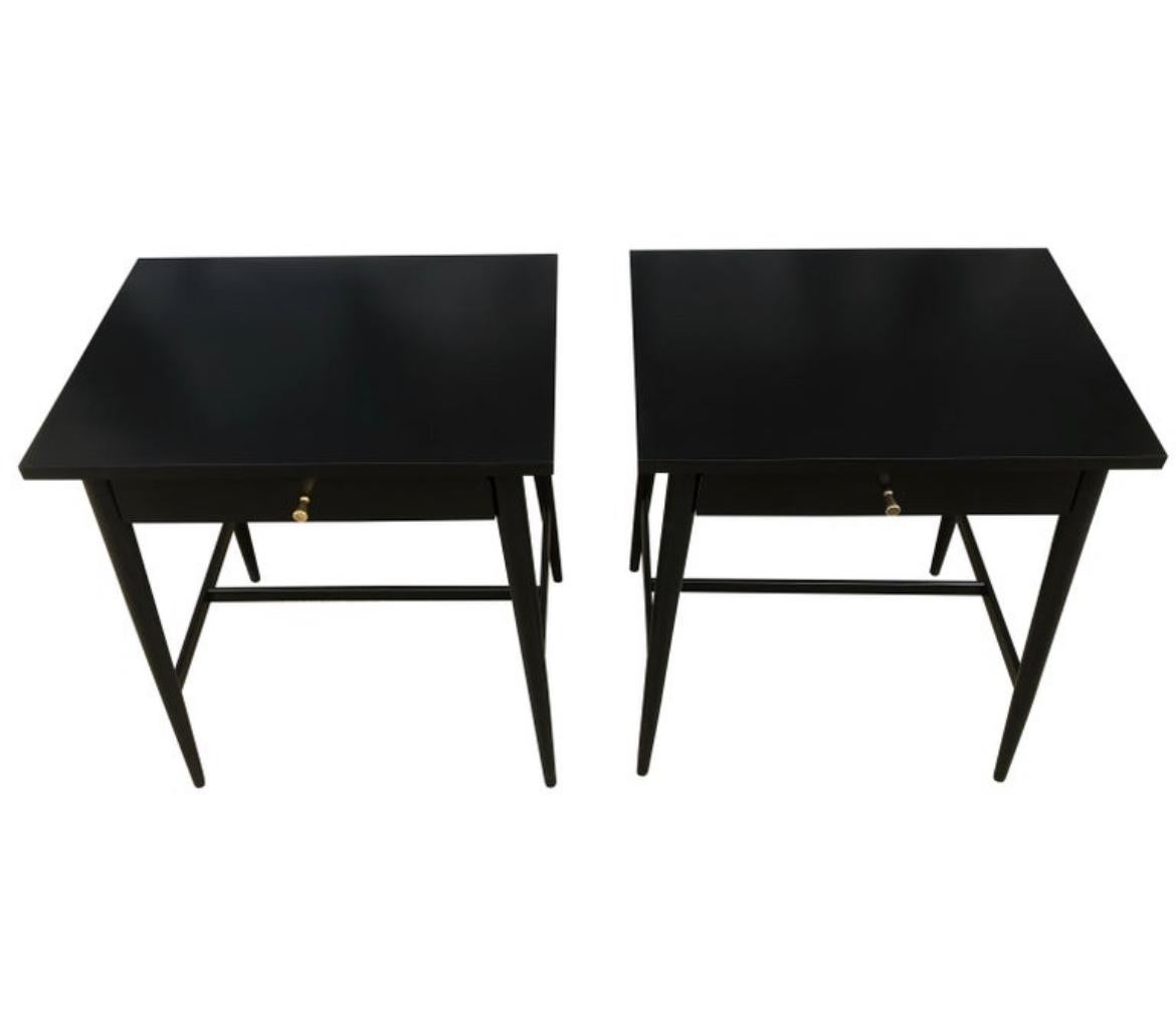 Beautiful pair of Paul McCobb Planner Group #1586 maple nightstands lamp tables single drawer Planner Group brass knobs Minimalist black lacquer. Very delicate designed pair of nightstands with tapered legs - thin cross brace - All solid maple -