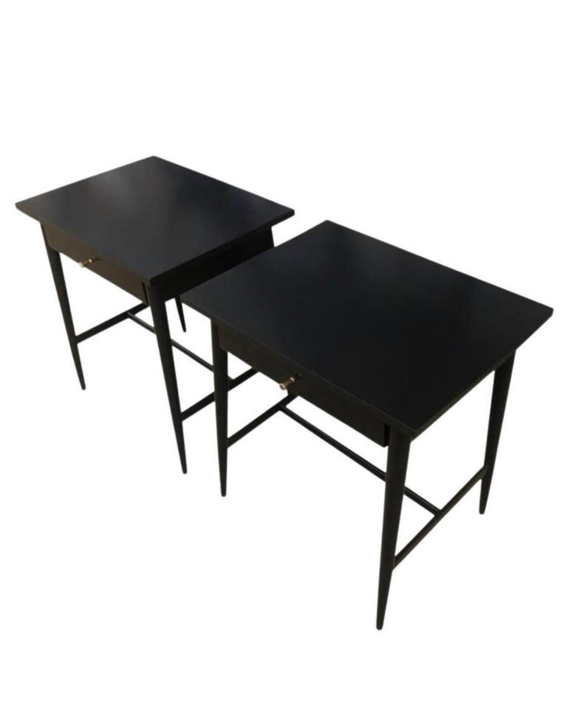Beautiful pair of Paul McCobb Planner Group #1586 maple nightstands lamp tables single drawer Planner Group brass knobs Minimalist black lacquer. Very delicate designed pair of nightstands with tapered legs - thin cross brace - All solid maple -