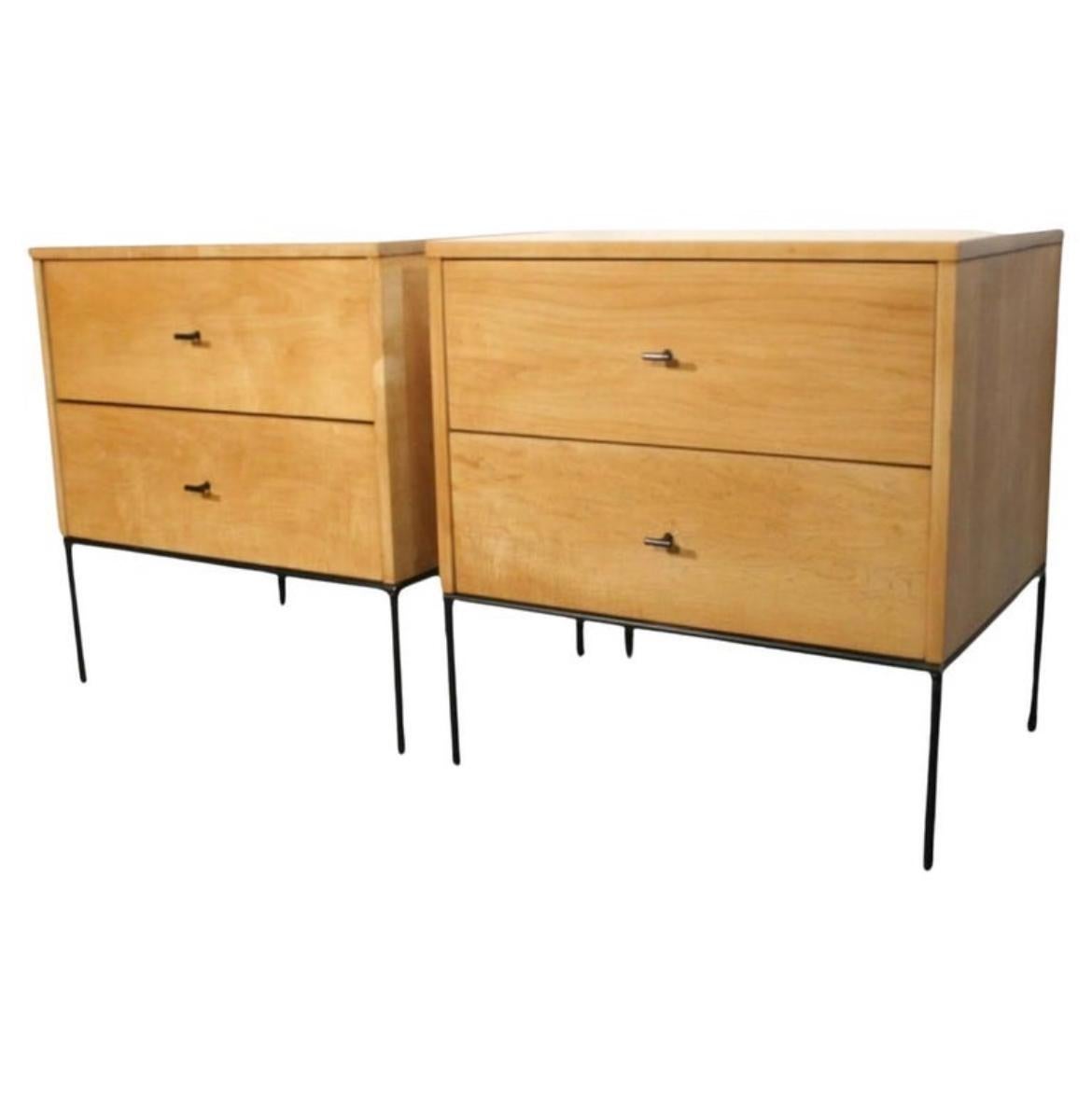 Beautiful pair of Paul McCobb 1950s #1503 blonde maple nightstands end tables double-drawer planner Group. Black steel T pull knobs.Finished in raw blonde maple. Very modern designed pair of nightstands with iron base with 4 legs. All solid maple.