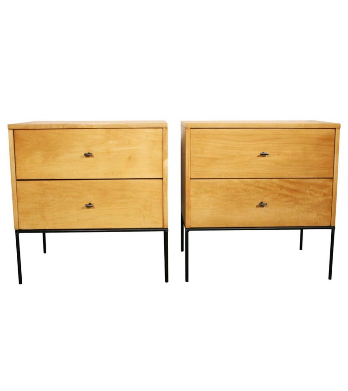 Beautiful pair of Paul McCobb 1950s #1503 blonde maple nightstands end tables double-drawer planner Group. Black steel T pull knobs. Finish is blonde maple. Very modern designed pair of nightstands with iron base with 4 legs. All solid maple. 

You