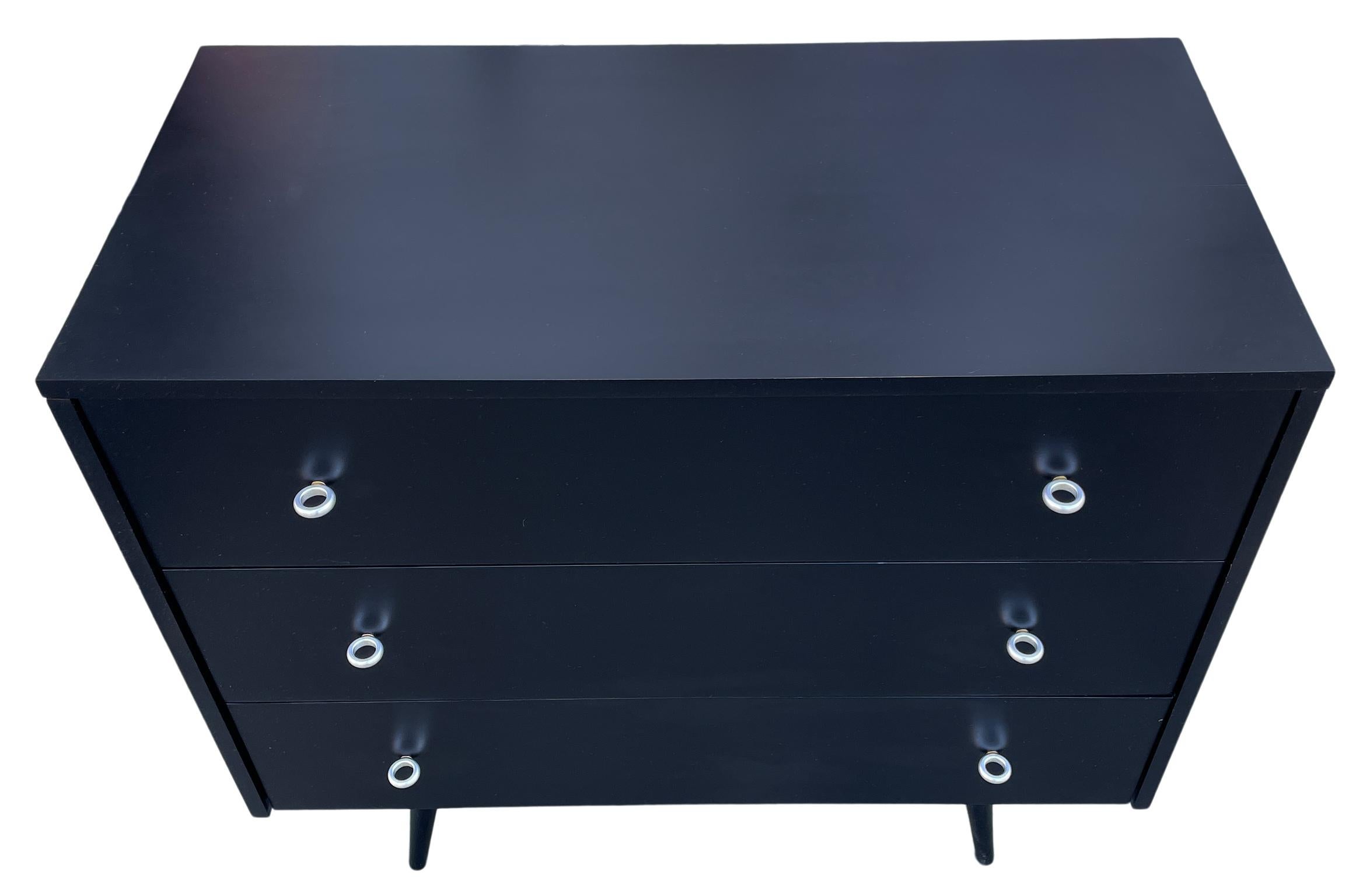 Mid Century Modern black lacquer three-drawer dresser by Paul McCobb for Winchendon Furniture Company. Part of the Planner Group. Located in NYC.

Measures: 36” W x 33.5” H x 18.25” D. Each drawer is 6” H.