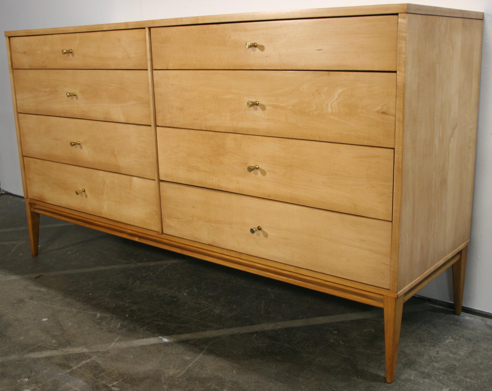 Vintage midcentury Paul McCobb 8-drawer dresser credenza Planner Group #1507. Beautiful dresser by Paul McCobb circa 1950s Planner Group, 8-drawer, solid maple, Brass cone pulls. Solid maple original base. Original foil label, clean inside and out.