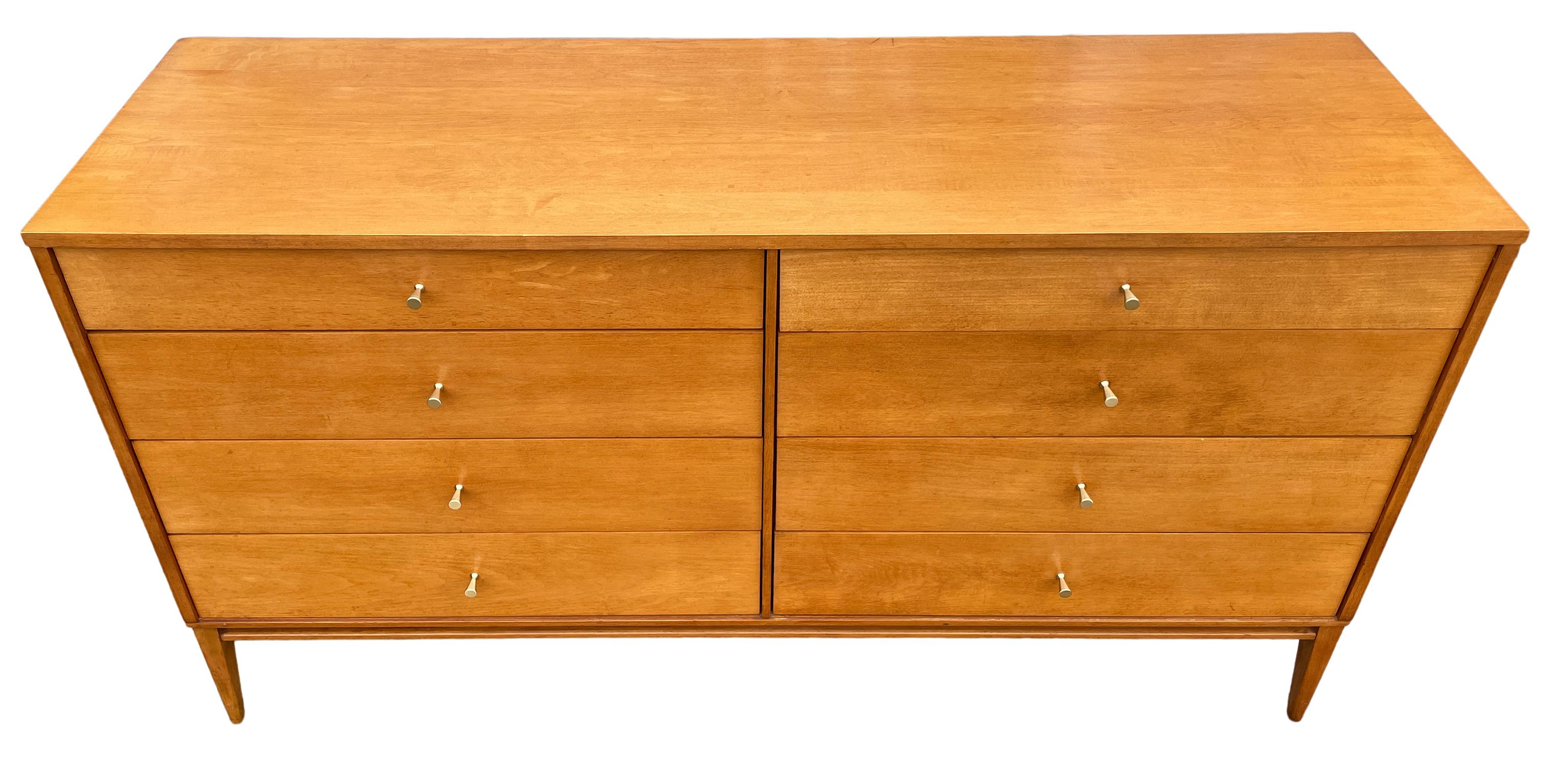 Vintage midcentury Paul McCobb 8-drawer dresser credenza Planner Group #1507. Beautiful dresser by Paul McCobb circa 1950s Planner Group 8-drawer solid maple polished Brass cone pulls with solid maple base. Original label clean inside and out.