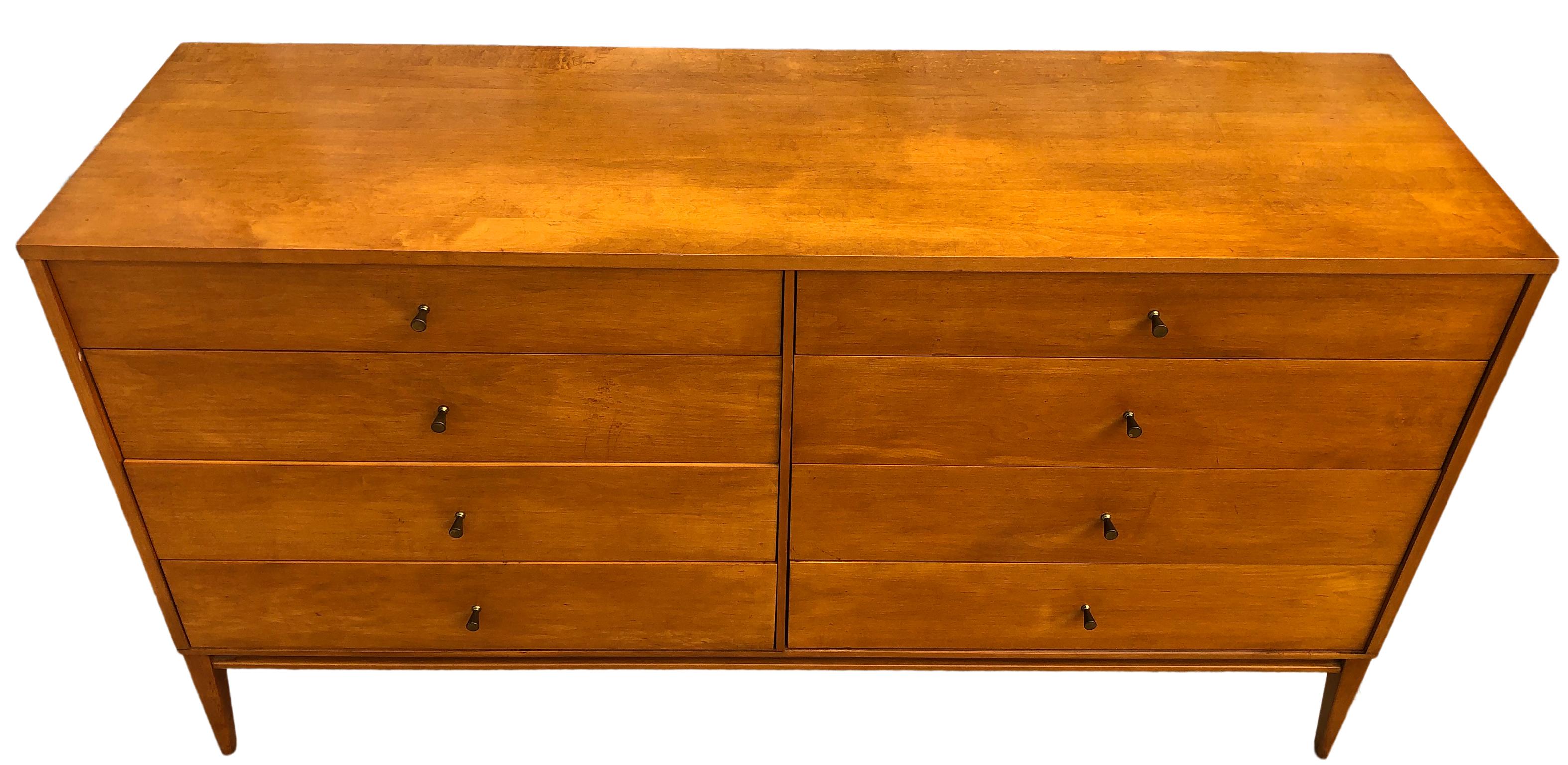 Vintage midcentury Paul McCobb 8-drawer dresser credenza Planner Group #1507. Beautiful dresser by Paul McCobb, circa 1950s Planner Group, 8-drawer, solid maple, brass cone pulls. Solid maple original base. Original foil label, clean inside and out.