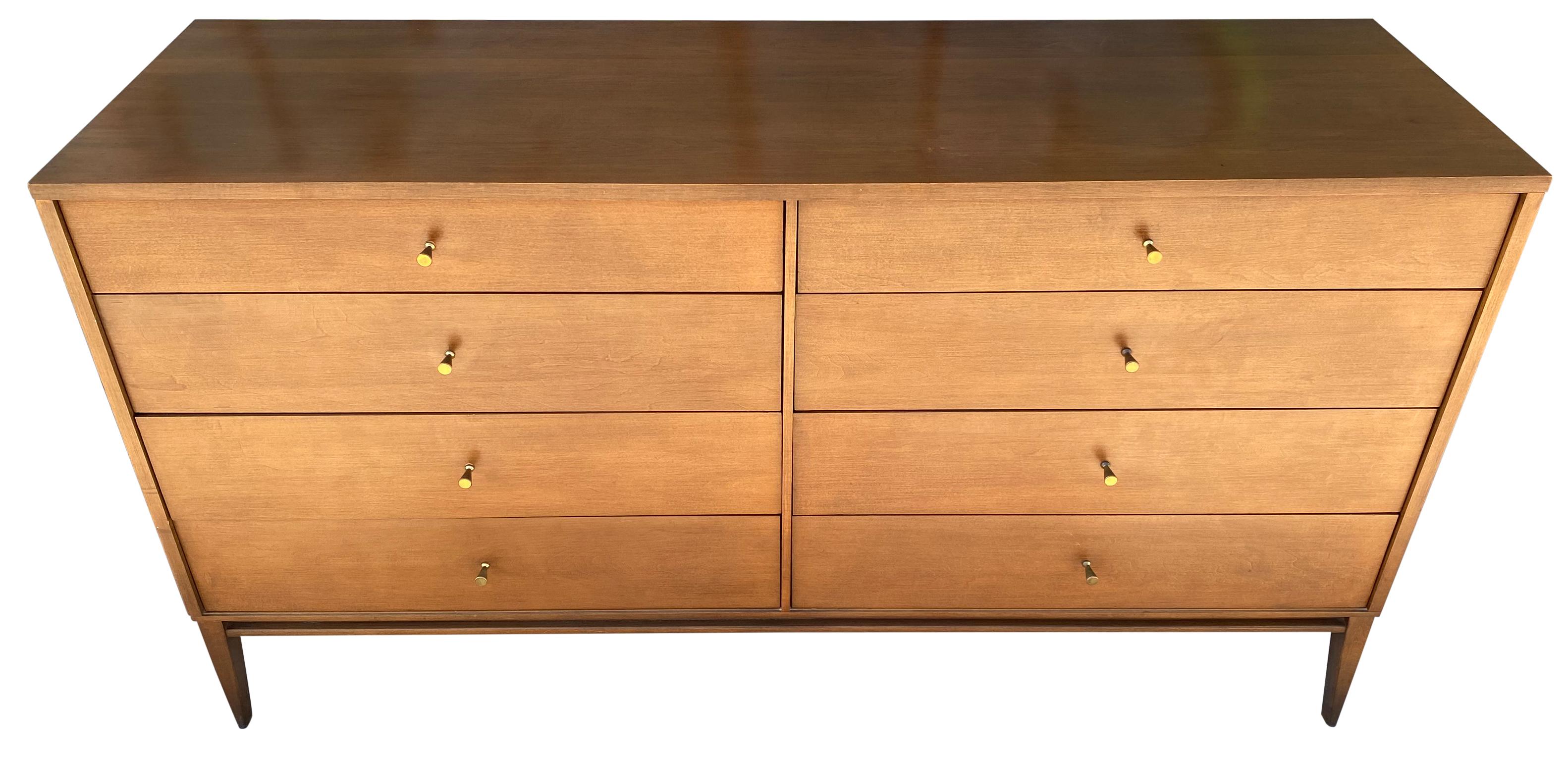 Vintage midcentury Paul McCobb 8-drawer dresser credenza planner group #1507. Beautiful dresser by Paul McCobb, circa 1950s planner group, 8-drawer, solid maple, brass cone pulls. Solid maple original base. Original foil label, clean inside and out.