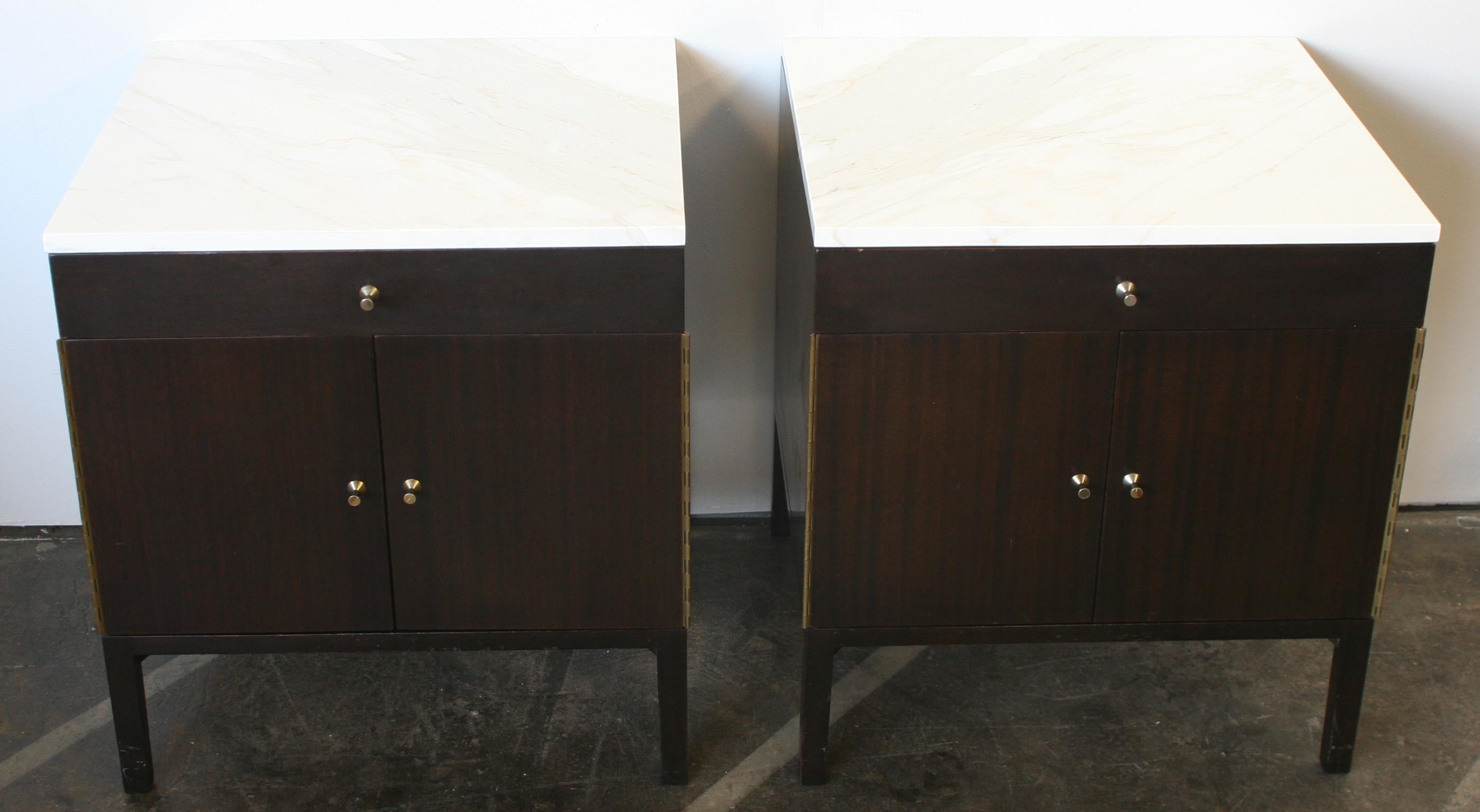 Beautiful pair of Paul McCobb early 1960s Production #7700 Walnut nightstands end tables with Calacatta gold Marble tops. Has single-drawer with lower cabinet that has 1 adjustable shelf. Original Vintage Condition. Very modern designed pair of