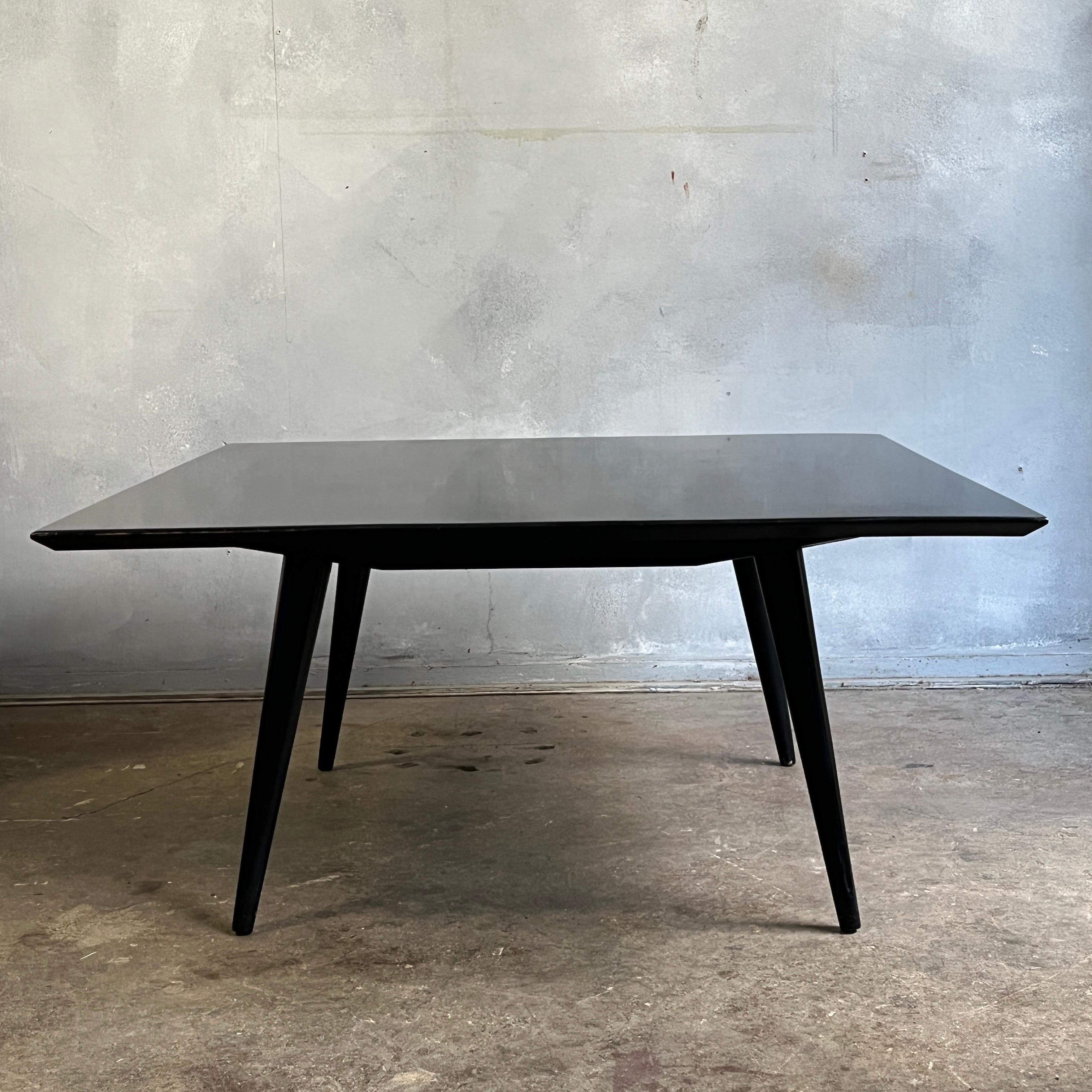 Beautiful Paul McCobb Planner Group #1546 solid maple 32'' square inch coffee table / bench in original heavy black lacquer finish with nice patina. Very delicate designed coffee table with tapered legs - All legs unscrew just fine. All solid maple.