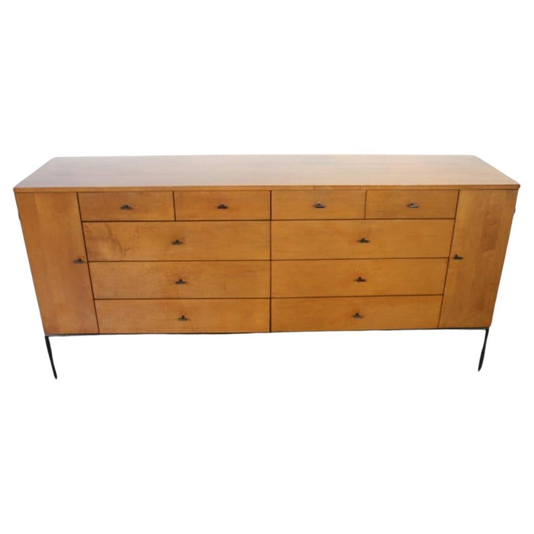 Mid century American Designer Paul McCobb Maple 20-drawer dresser #1510 Tobacco finish T Pulls. Original patina finish in good vintage condition - Has steel T Pulls - All solid maple with a Light blonde Tobacco finish - Minimalist Iron base with 4
