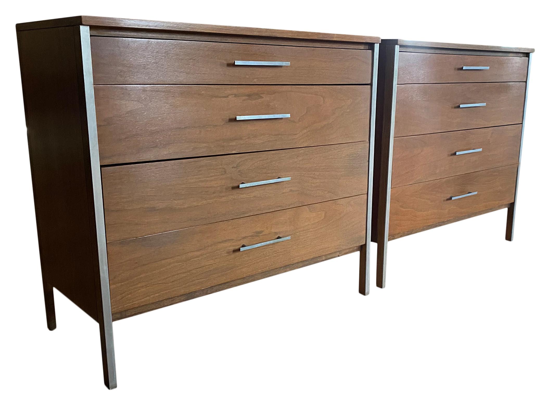 Beautiful pair of Paul McCobb Calvin walnut dressers with 4 drawers Calvin aluminum handles and accents Minimalist original medium walnut brown finish. Very delicate geometric designed pair of Dressers with square legs, all solid wood, original