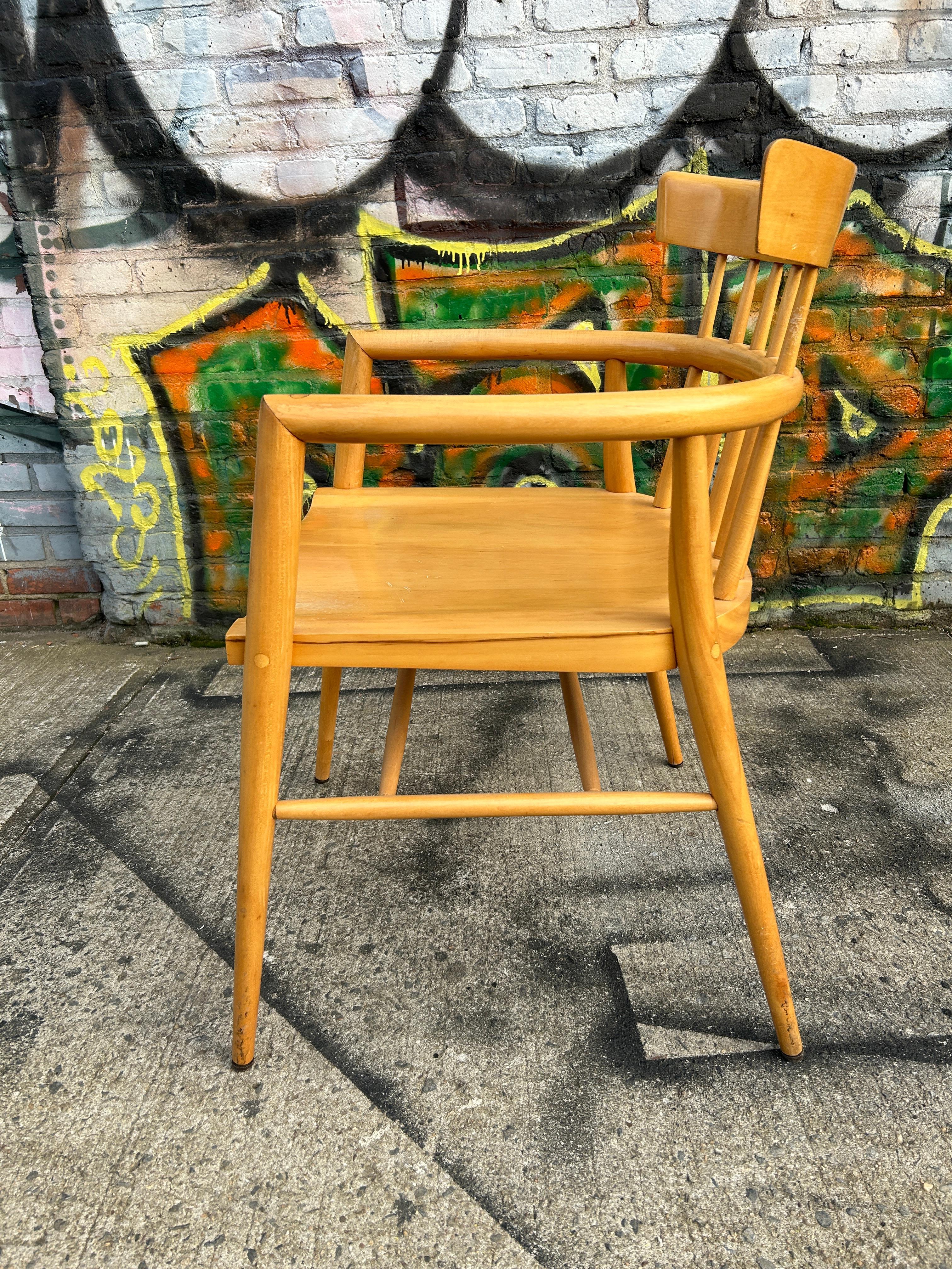 Beautiful all original midcentury maple Paul McCobb Planner Group Captain arm chair. Solid maple seat and curved back on tapered legs. Original vintage condition. Original blonde tobacco finish with beautiful patina. this chair is marked Paul McCobb