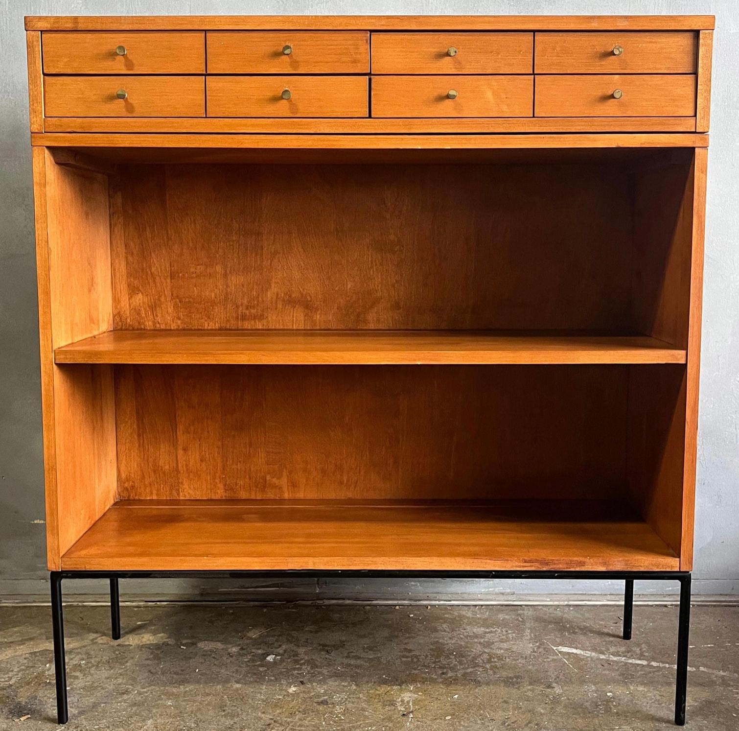 Vintage midcentury Paul McCobb single bookcase #1516 or display cabinet. Solid maple with on iron base. Beautiful bookcase by Paul McCobb, circa 1950s Planner Group, Included is the detachable 4-drawer miniature chest of drawers as originally