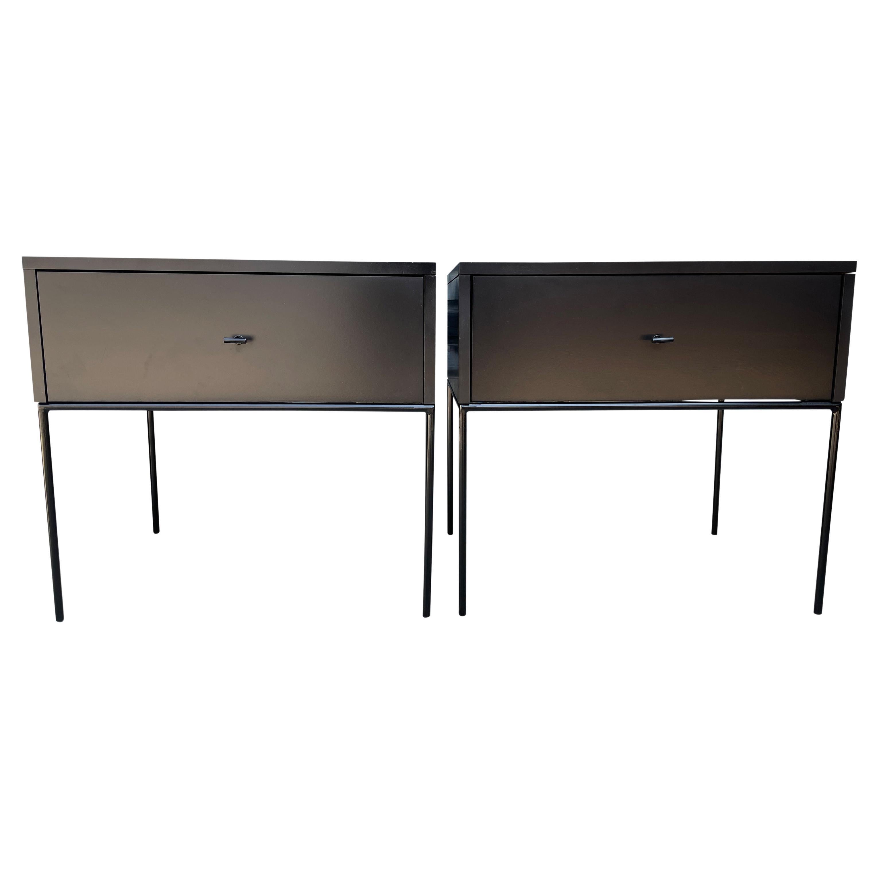 Beautiful pair of Paul McCobb planner group #1500 maple nightstands end tables single drawer. Black T pull knobs. Good vintage condition with Black lacquer finish on maple. Very modern designed pair of nightstands with iron base with 4 legs. All