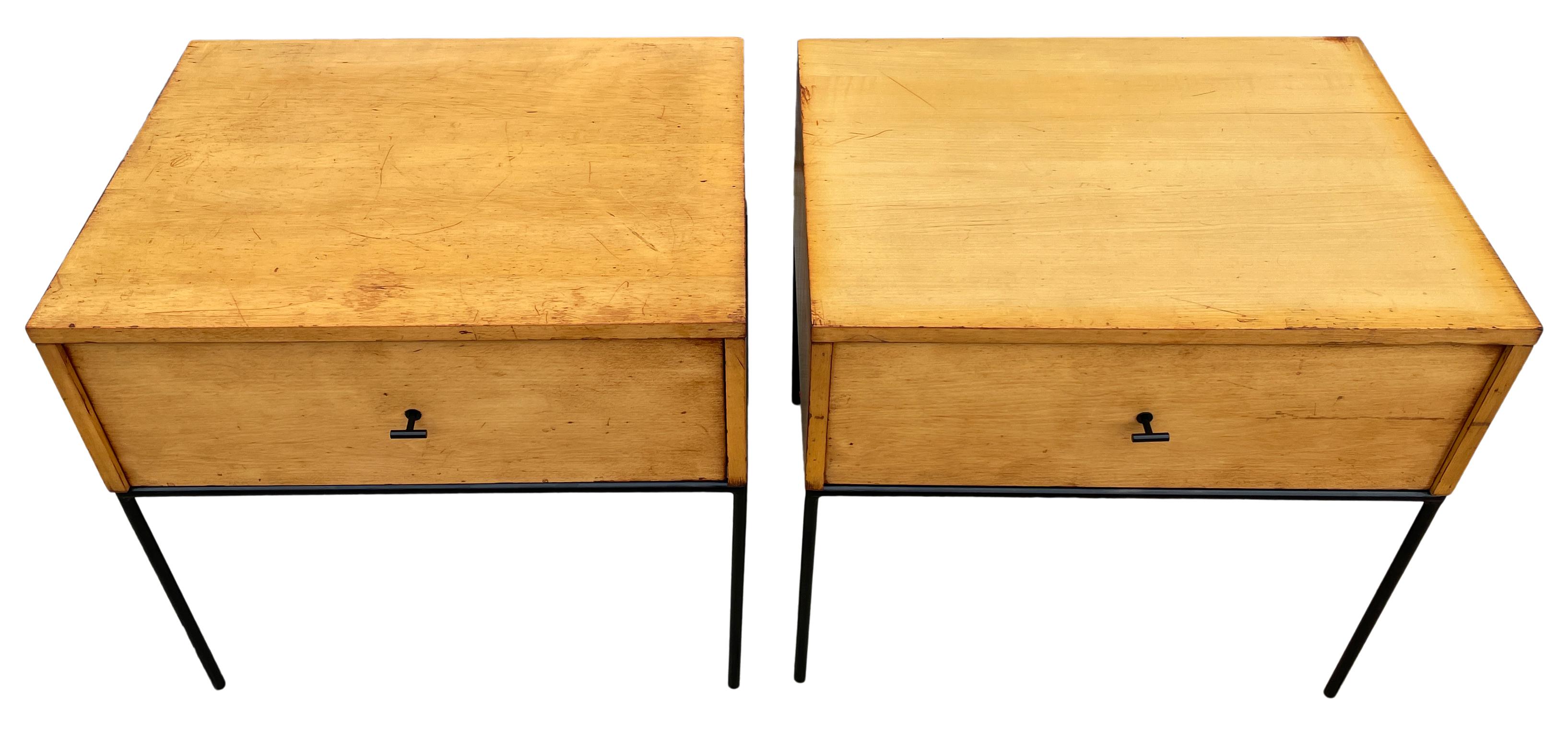 Beautiful pair of Paul McCobb planner group #1500 maple nightstands end tables single drawer. Black T pull knobs. Original vintage used condition with Blonde finish on maple. Very modern designed pair of nightstands with iron base with 4 legs. All