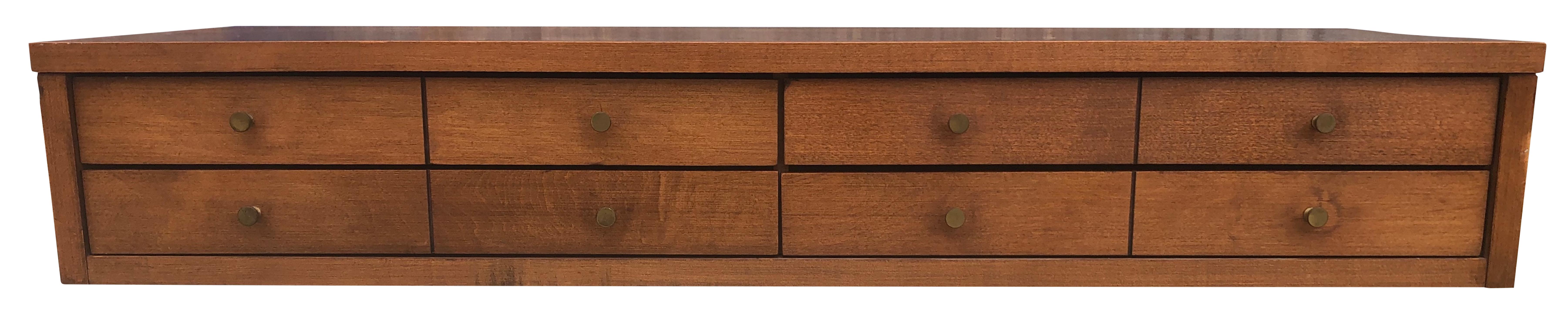 Nice Paul McCobb 3' small chest of drawers in solid maple construction with tobacco finish. Very high quality construction with original brass pulls. Made for top of dresser or bookcase. 8 brass knobs 4 drawers. Planner Group, Winchendon Mass. In