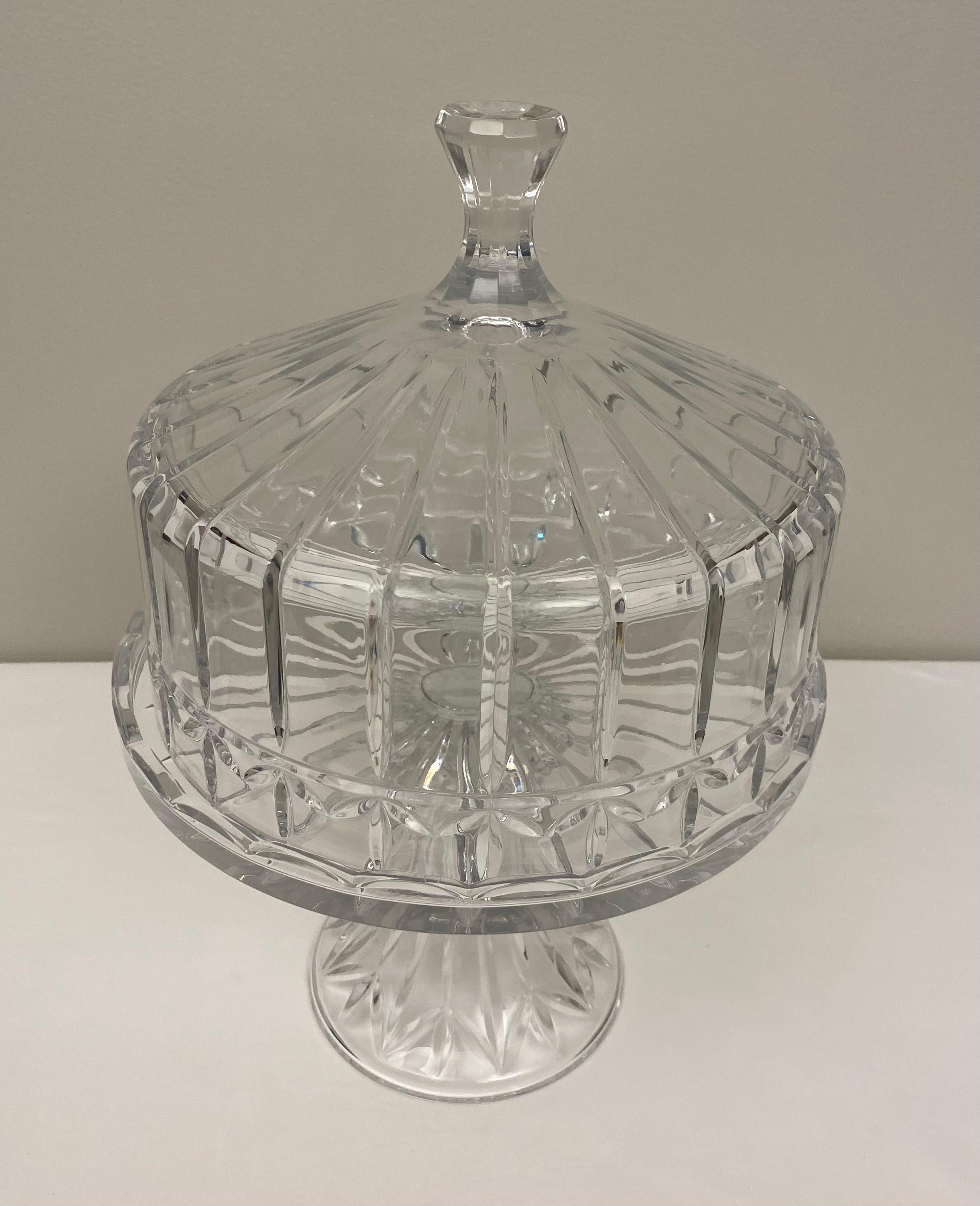 This delightfully heavy, cut crystal cake or patisserie stand sits on a pedestal base. Perfect for displaying your culinary confections, this piece’s simple, elegant look will mix with any decor.

Dimensions: 11 3/4