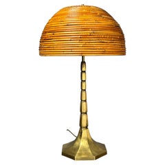 Midcentury pencil reed rattan bamboo and brass table lamp. 1970s