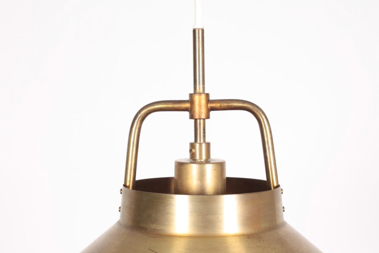 Pendant in patinated brass designed by Frits Schlegel for Lyfa. Made in Denmark, great original condition.
    