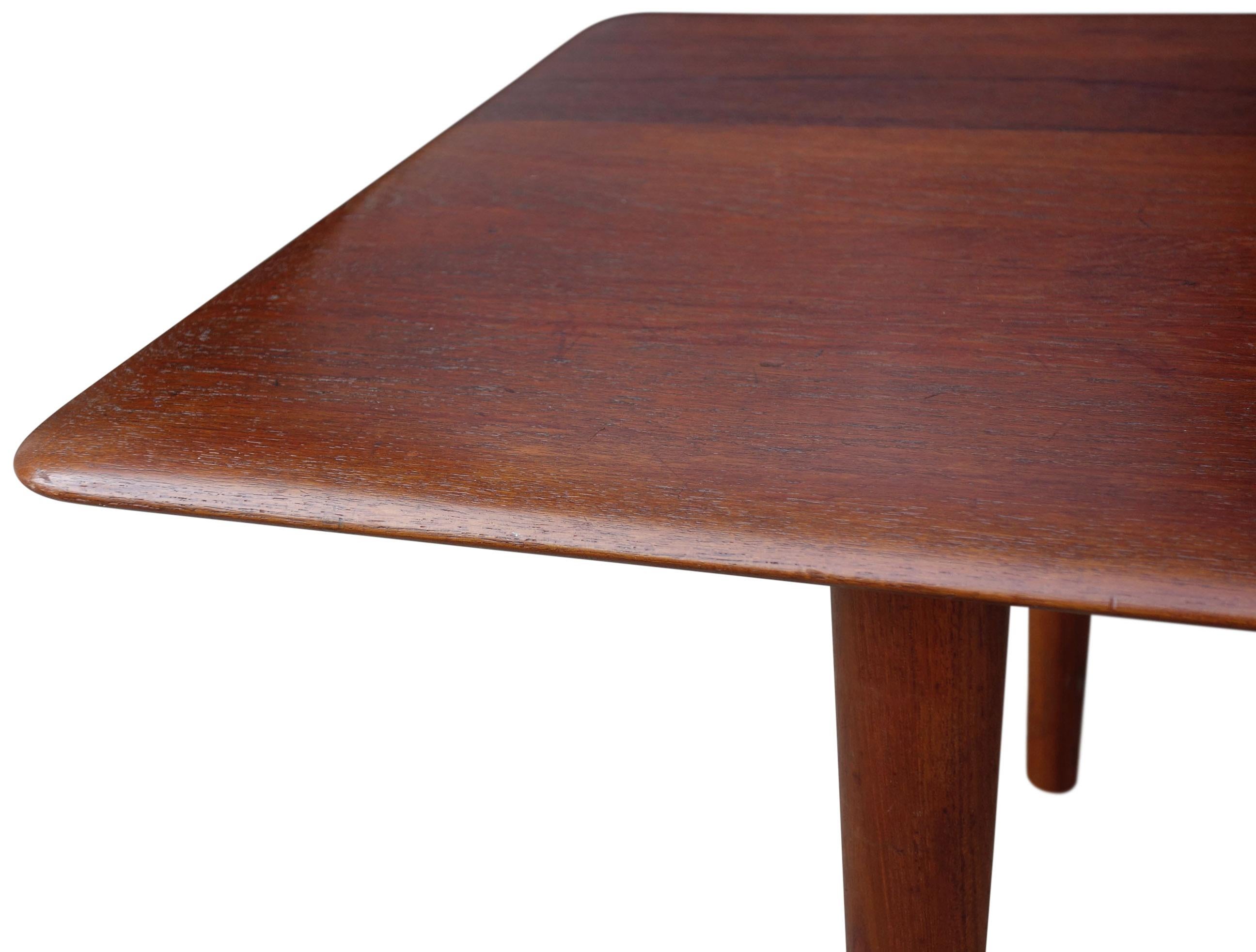 For your consideration is this beautiful Danish teak coffee table featuring a wonderful patina throughout. The curved knife edge brings a rich design with simple form. We left this table alone with minor imperfections adding to the charm. One of our