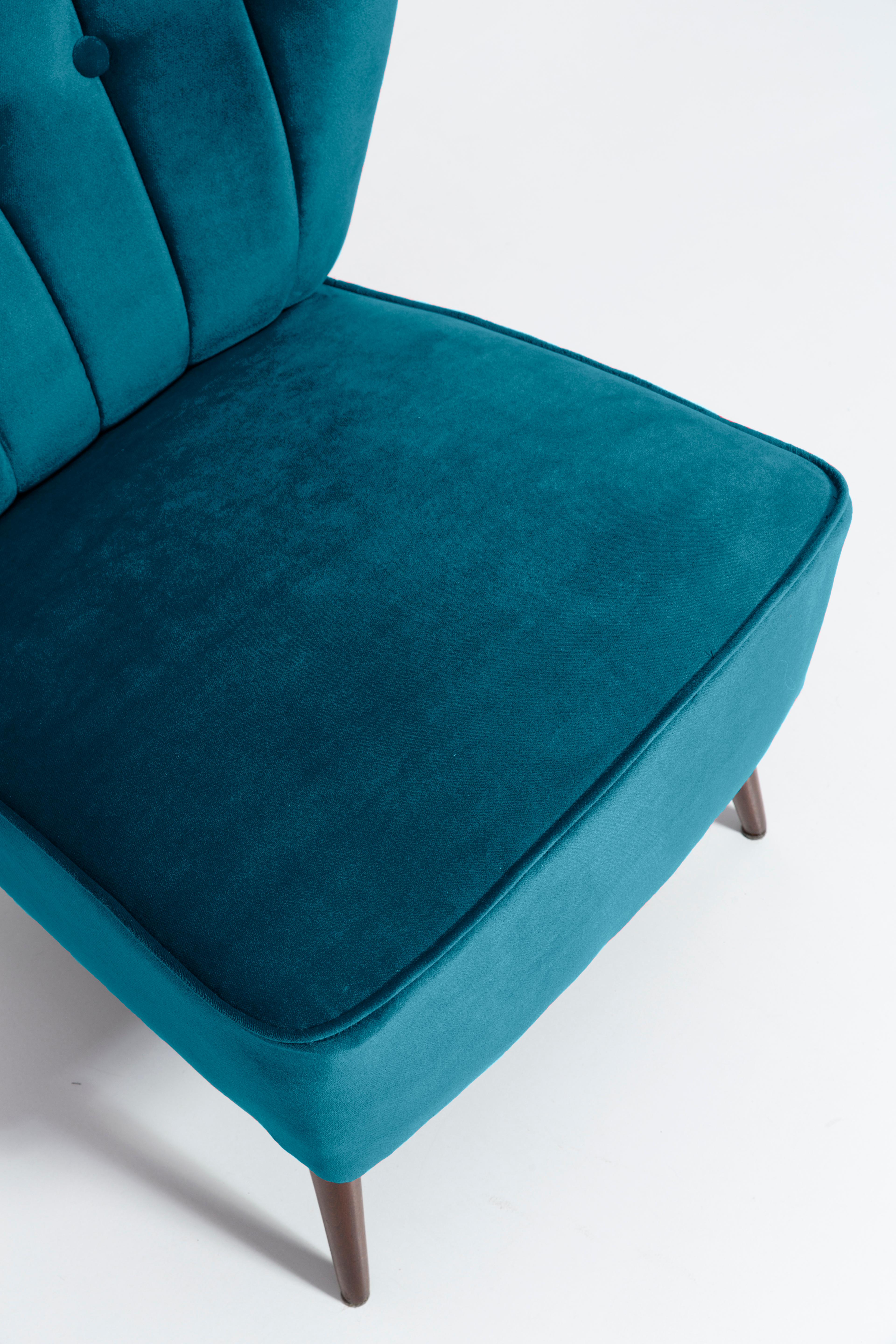 Springy, very comfortable and stabile polish club seat. Produced in the 1960s at the Karl Lindner factory in Germany. Original Vintage amazing furniture. The whole armchair is covered with high-quality italian petrol blue velour (color 973). Very