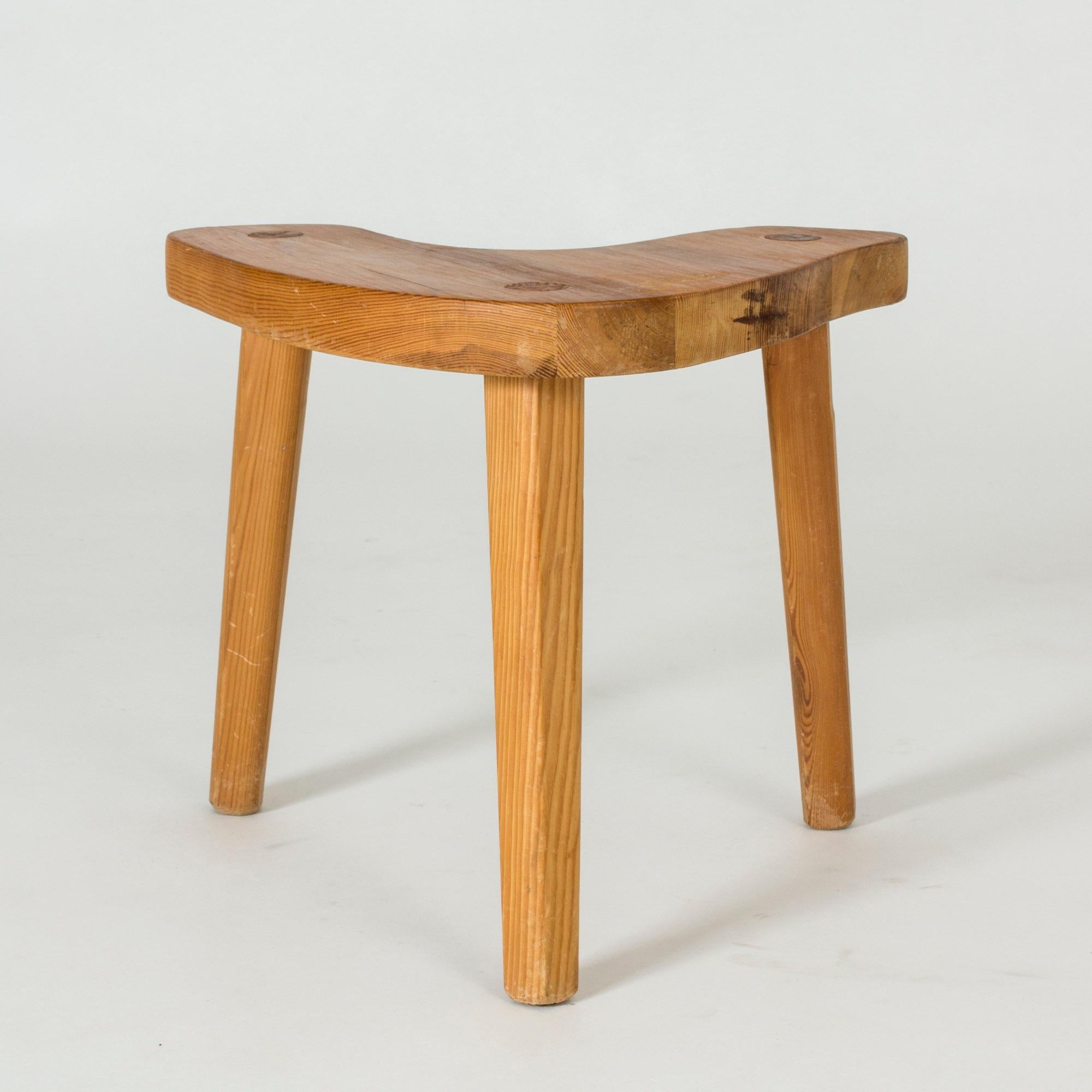 Cool midcentury stool, made from pine. Rustic U-shaped design with accentuated joinery.