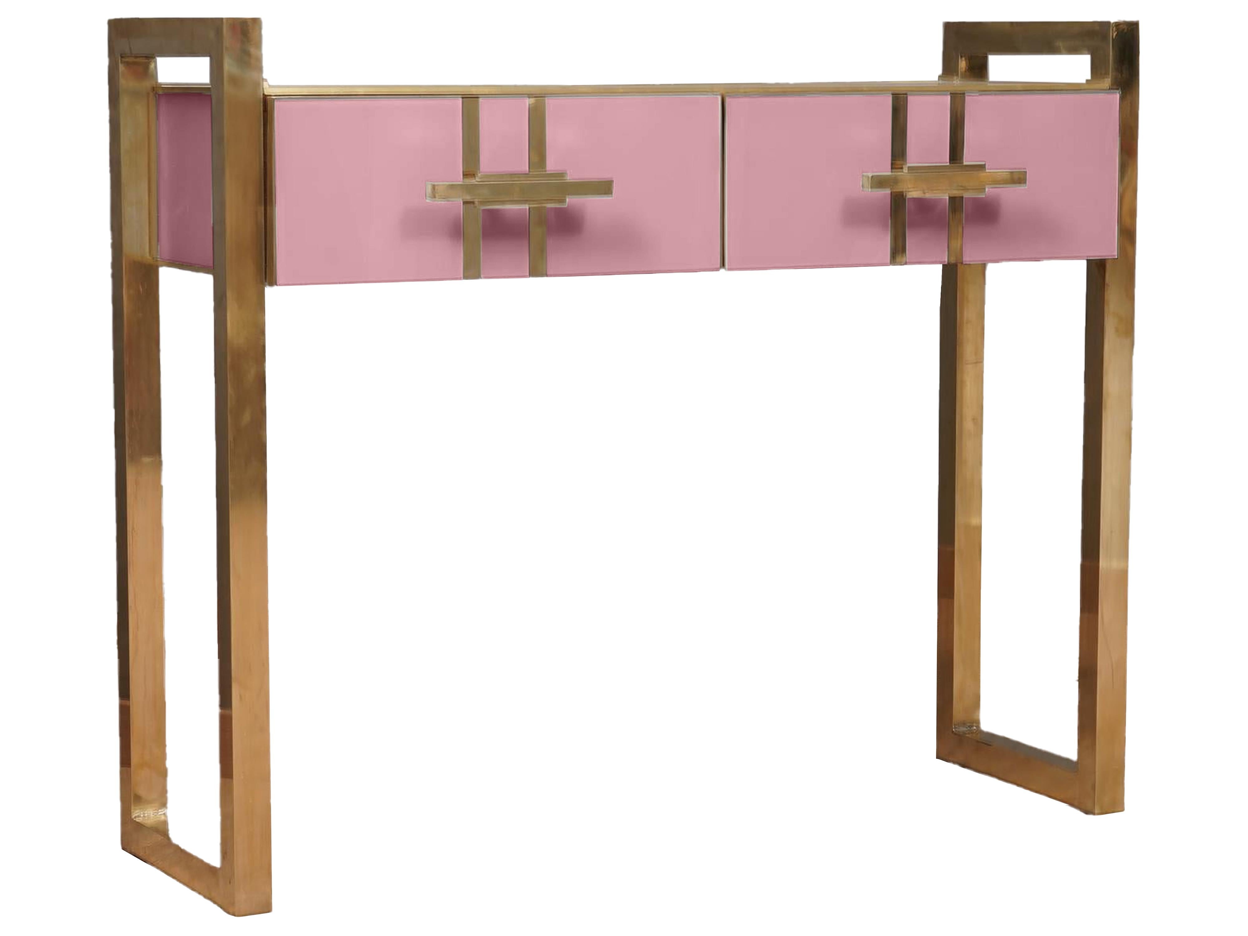Discover the exquisite MidCentury Pink Murano Glass Console Table, a masterpiece of Italian craftsmanship. 

This unique piece stands out for its originality and the luxurious combination of materials used in its construction. 

The console's body