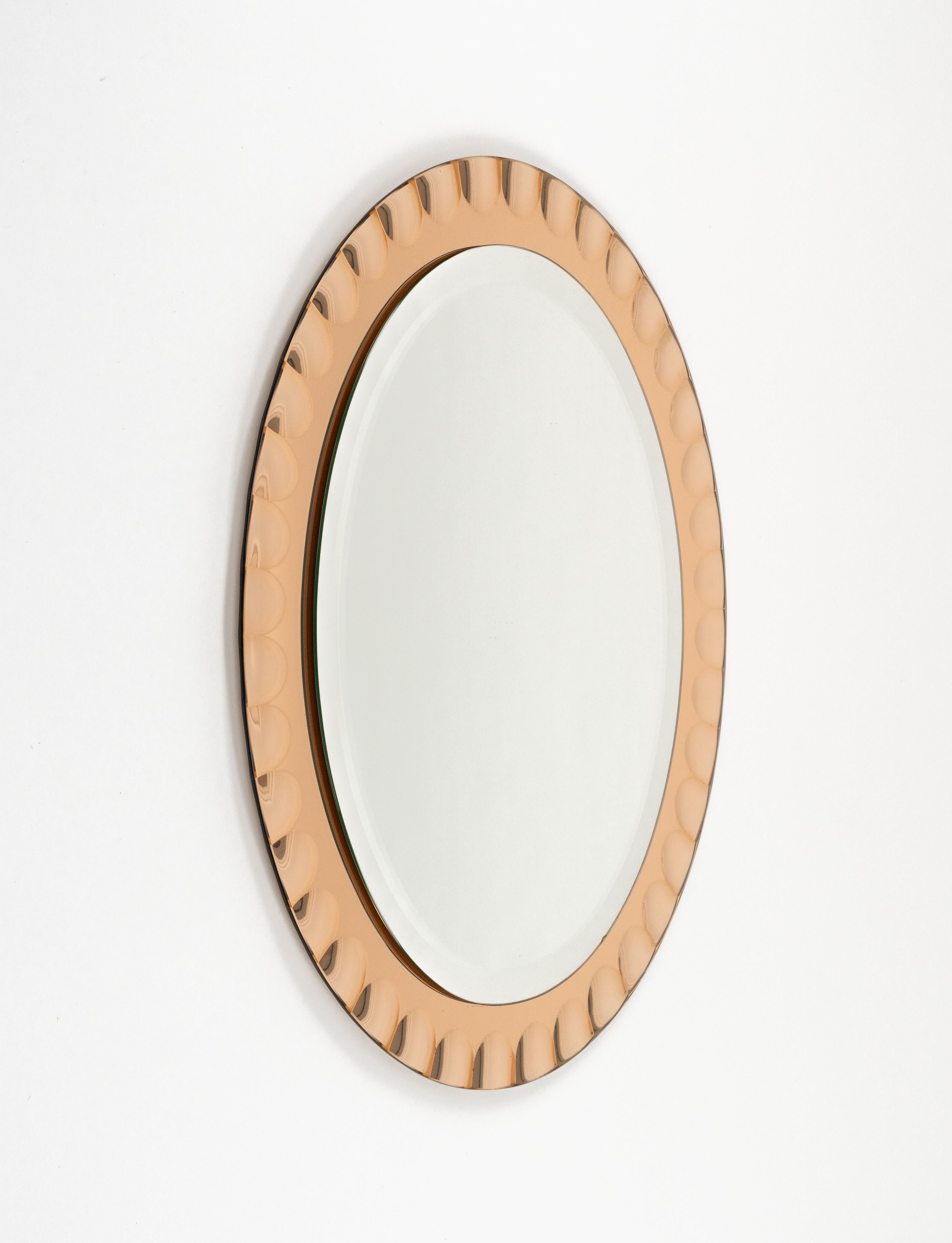 Midcentury amazing oval wall mirror with antique pink frame by Antonio Lupi for Cristal Luxor.

Made in Italy in the 1960s.

The original label is still attached as shown in the pictures.

