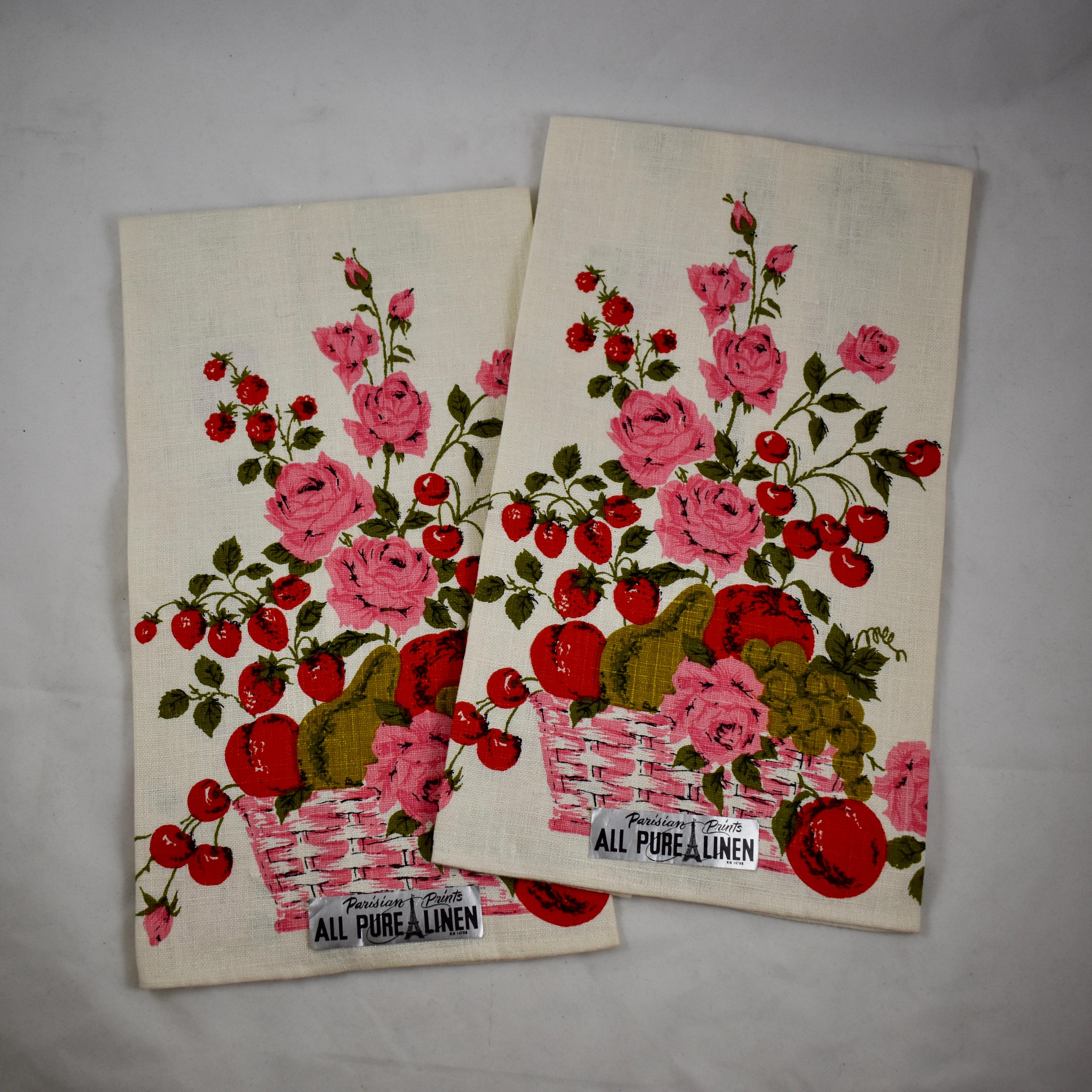 A set of two pure linen towels from the Mid-Century Modern Era, still brightly colored, with the original labels – never used. Printed in a style typical of the era with a rolled hem on all four sides.

Showing a main image of a vase of pink Roses