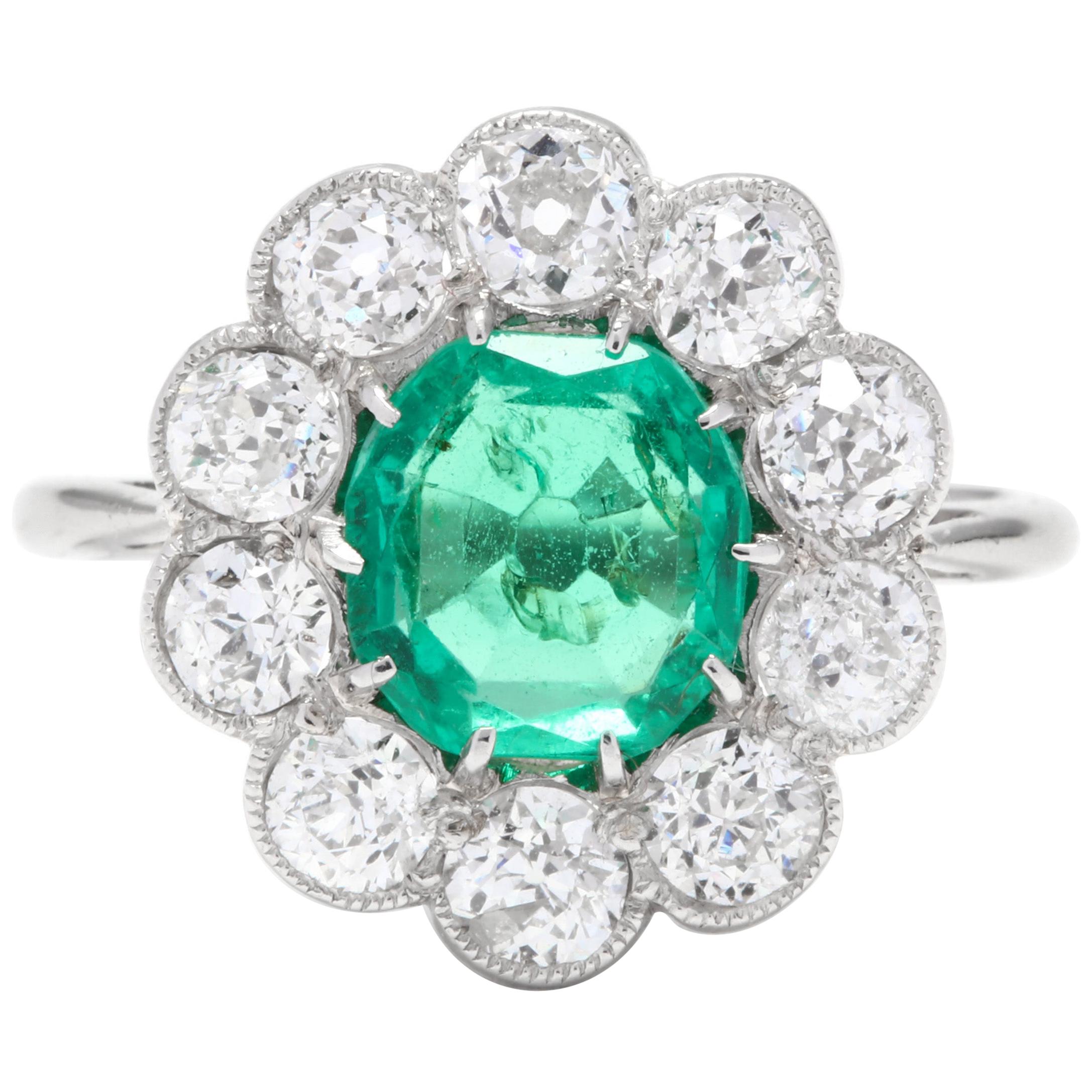 Midcentury Platinum, Emerald and Diamond Halo Ring