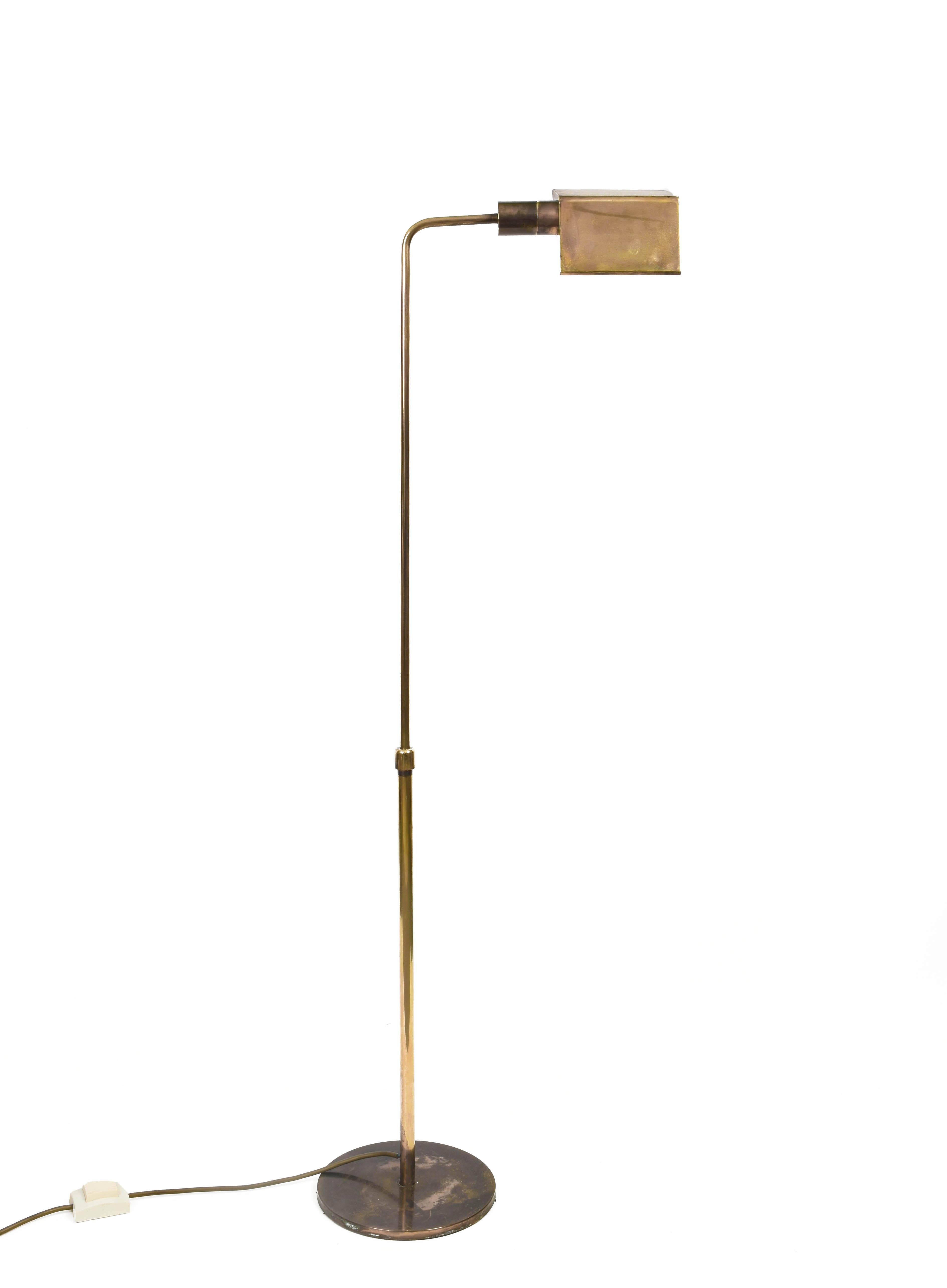 Classic Mid-Century Modern and elegant floor lamp in polished brass. This piece was produced in Italy during 1960s. 

This item is fantastic as it is adjustable in height along the body and the cap is fully adjustable vertically, rotating for an