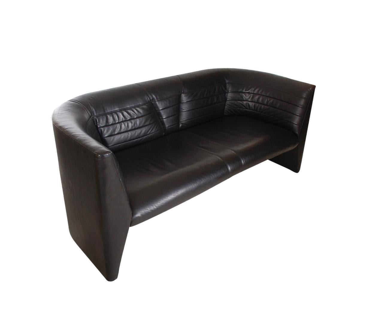 A gorgeous high quality and chic design proceed by Helikon Furniture Company in the 1990s. It features gorgeous Art Deco form and stitching in soft black leather.