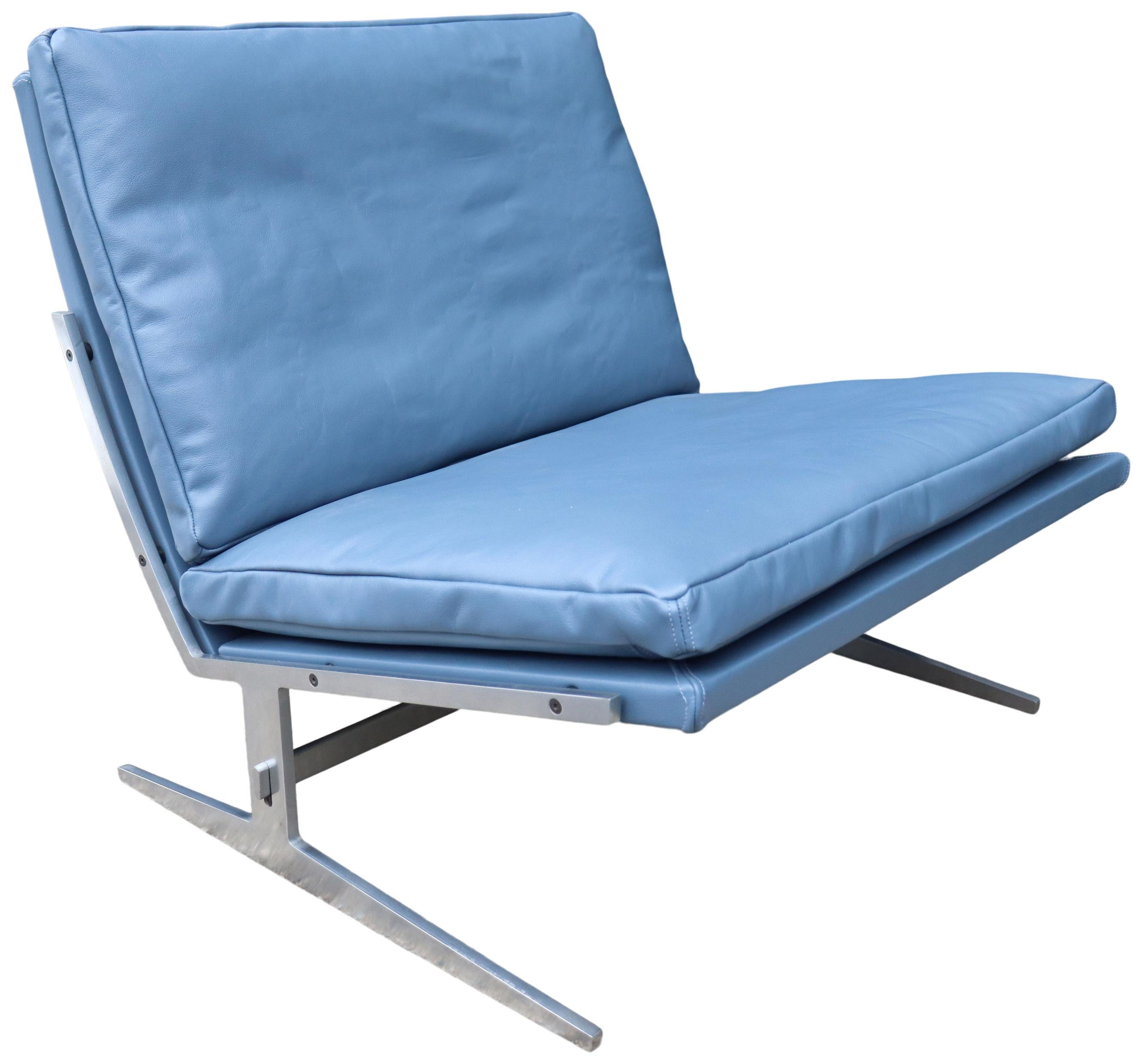 For your consideration is this amazing Jørgen Kastholm & Preben Fabricius lounge chair in new leather upholstery matching the original blue color. Featuring a leather wrapped frame with down filled cushions on a stainless steel frame. A departure