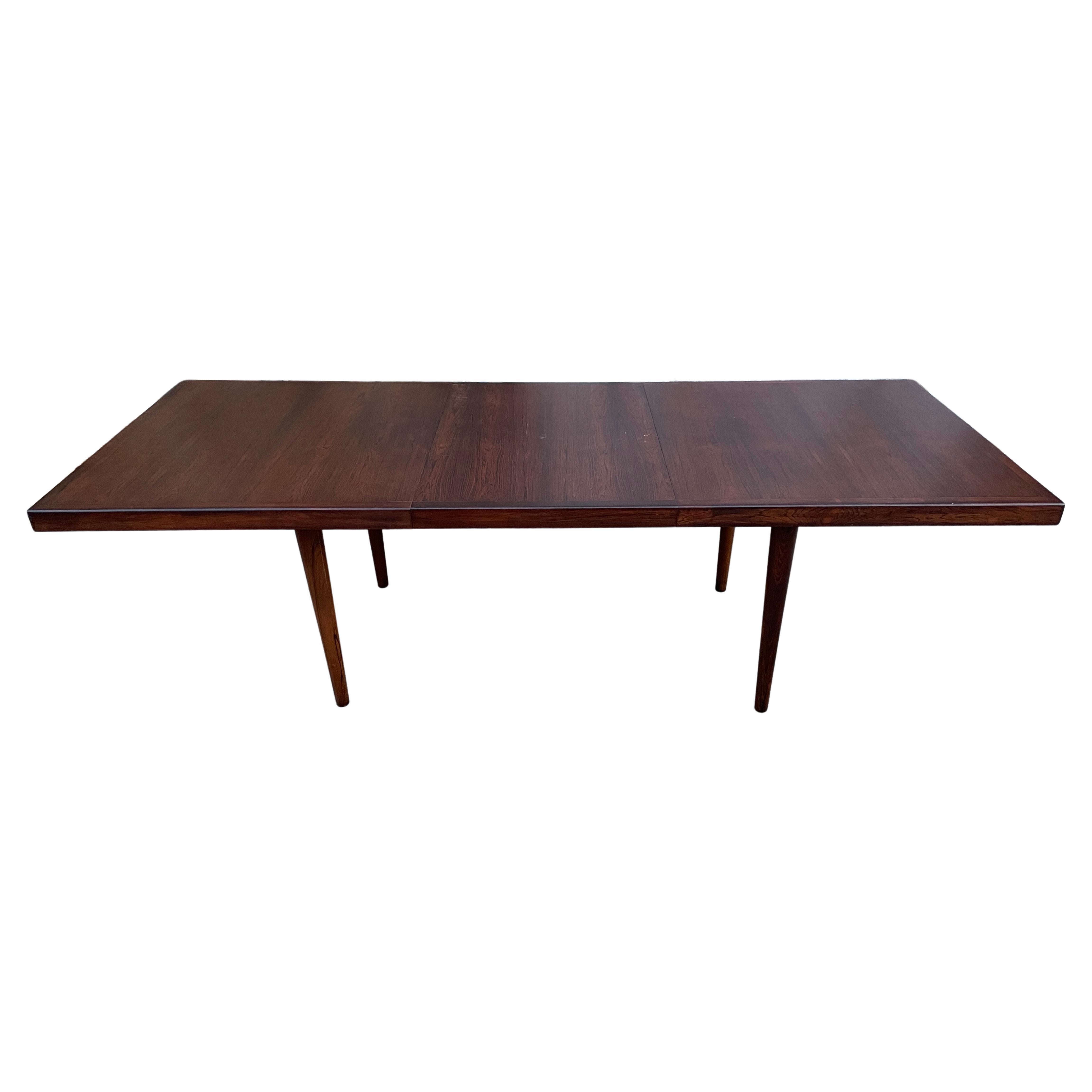 Midcentury Rare Solid minimalist Rosewood Expandable Dining Table with 1 Leaf For Sale