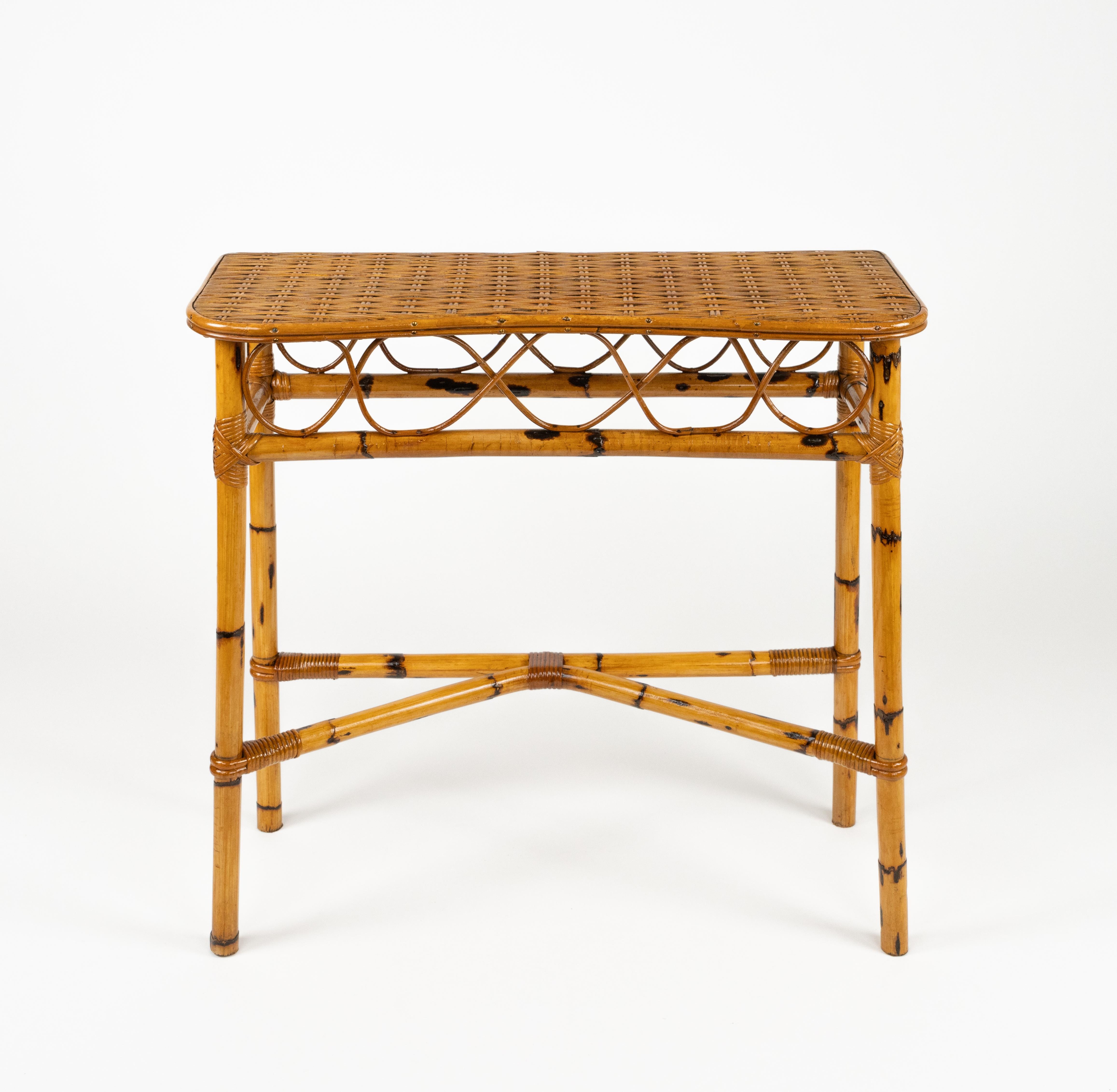 Midcentury wonderful console table in bamboo and rattan in the style of Franco Albini.

Made in Italy in the 1960.

Bamboo / rattan has been polished by a professional restorer.
