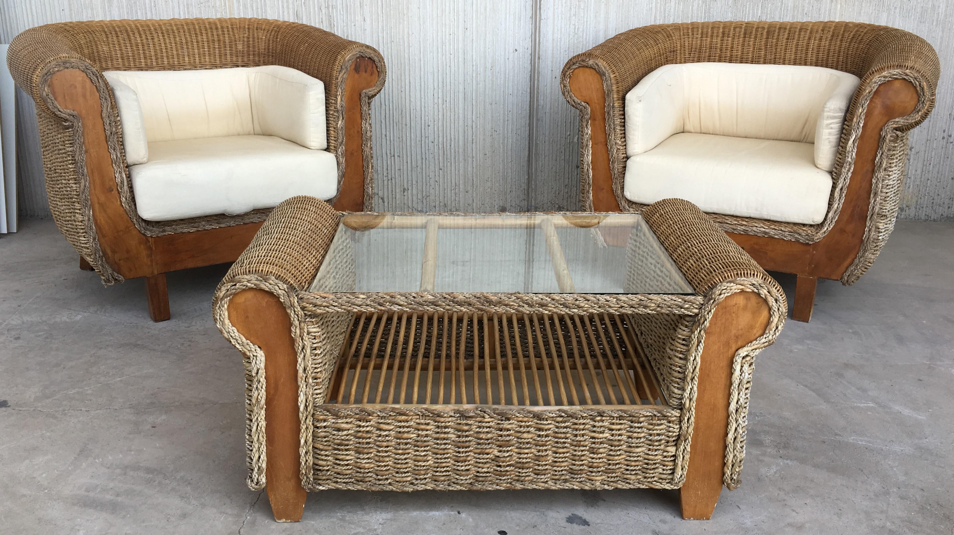 Midcentury Rattan & Wood Coffee table
Available Living room set

Armchairs measurements: 
Depth 31.88 in
Width 43.70 in
Height 31.50 in
Seat height 19.29 in.