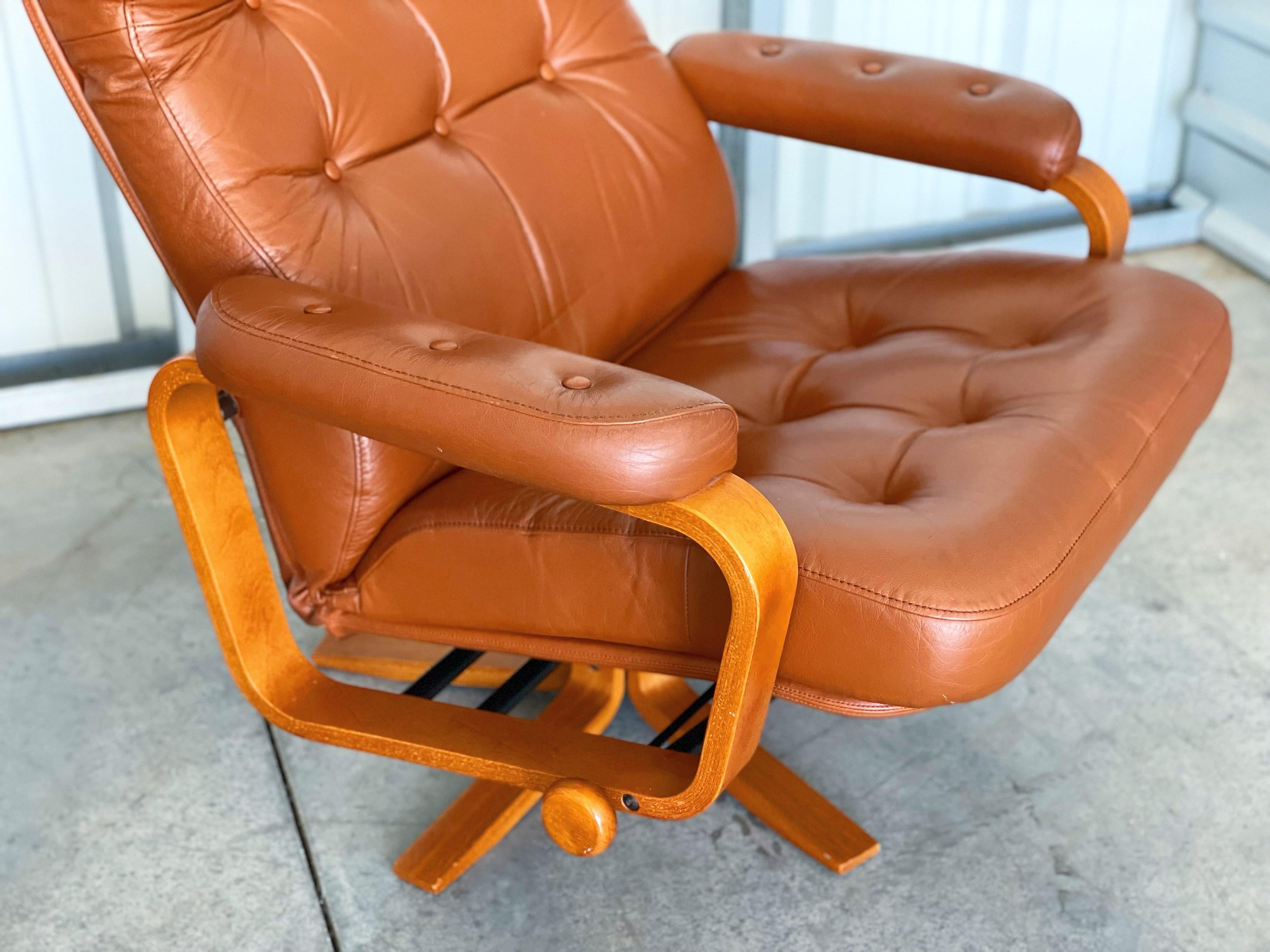 Danish Midcentury Reclining Lounge Chair and Ottoman in Leather + Teak by Svend Skipper