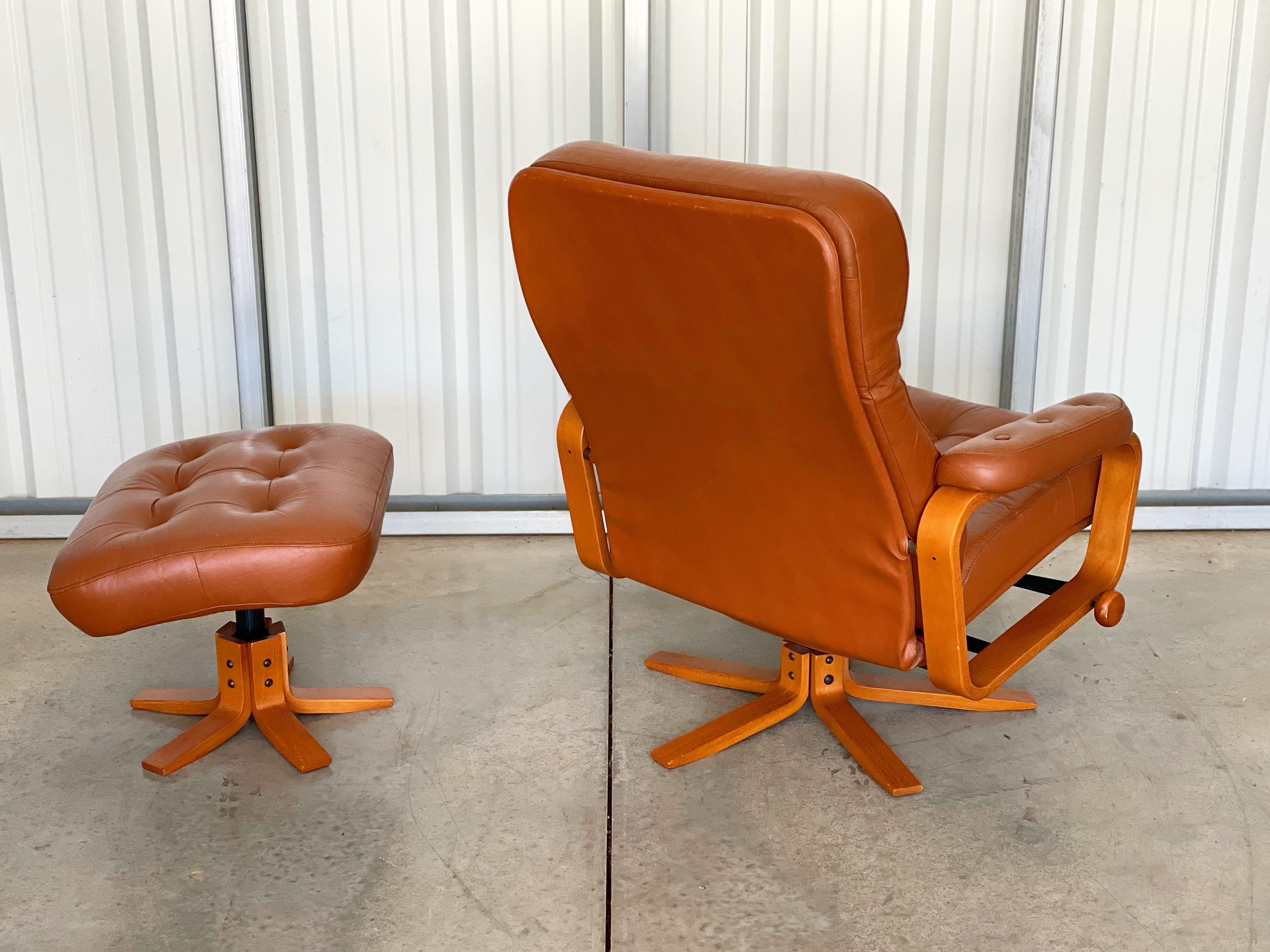 Late 20th Century Midcentury Reclining Lounge Chair and Ottoman in Leather + Teak by Svend Skipper