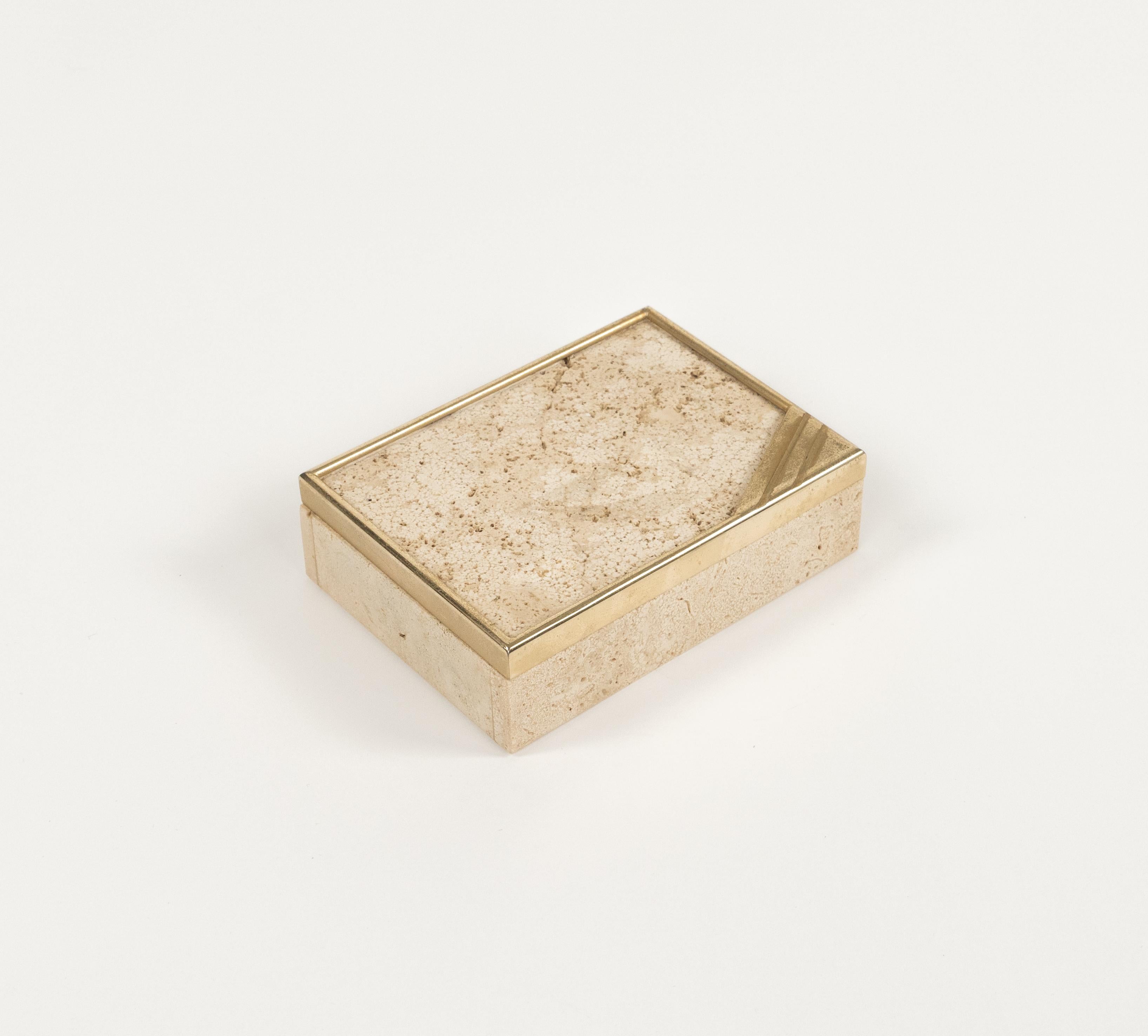 Midcentury beautiful rectangular box in travertine and brass in the style of Enzo Mari.  

Made in Italy in the 1970s.  

Perfect desk object or gift idea.