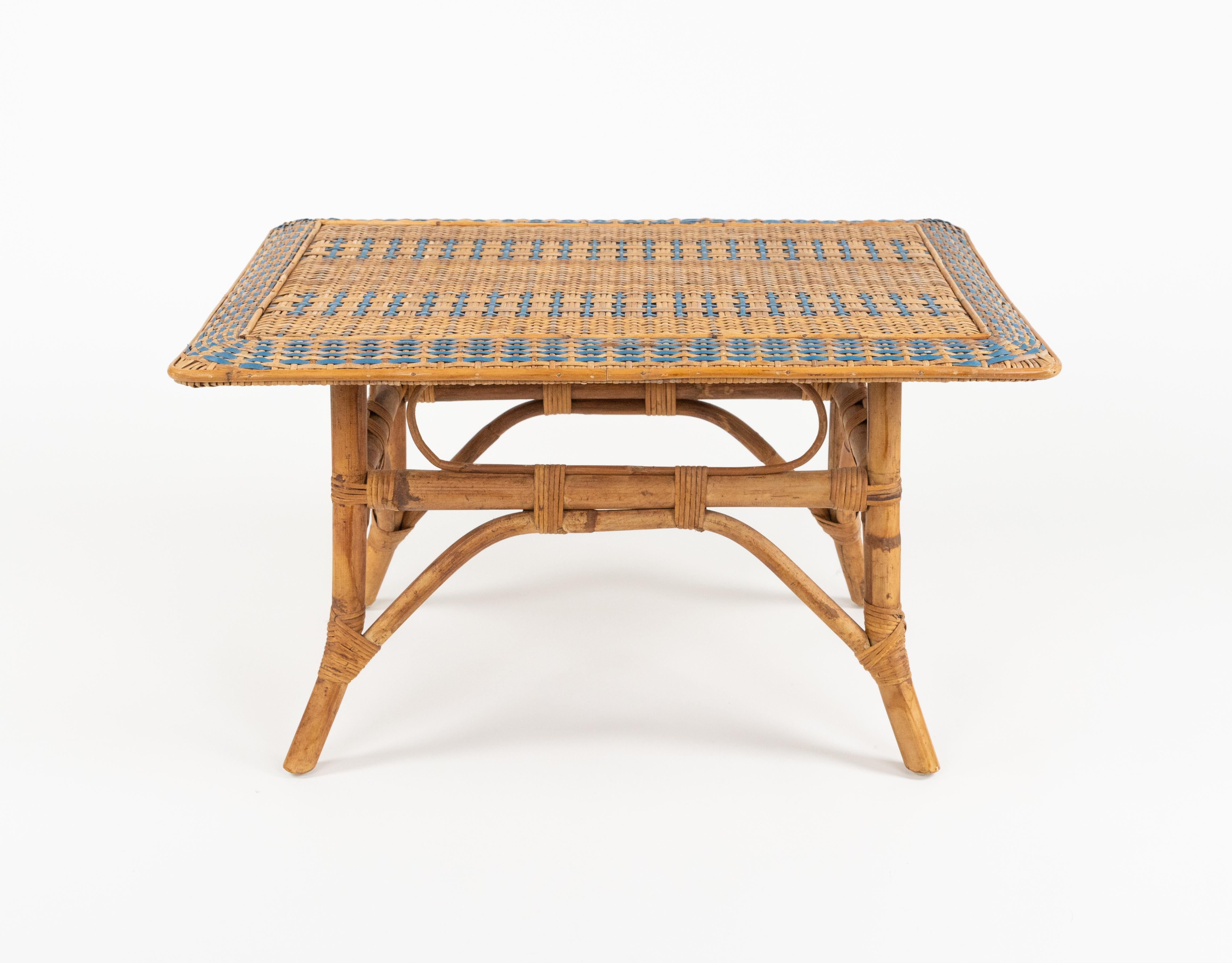Midcentury amazing rectangular coffee table in bamboo and rattan.

Made in Italy in the 1960s.