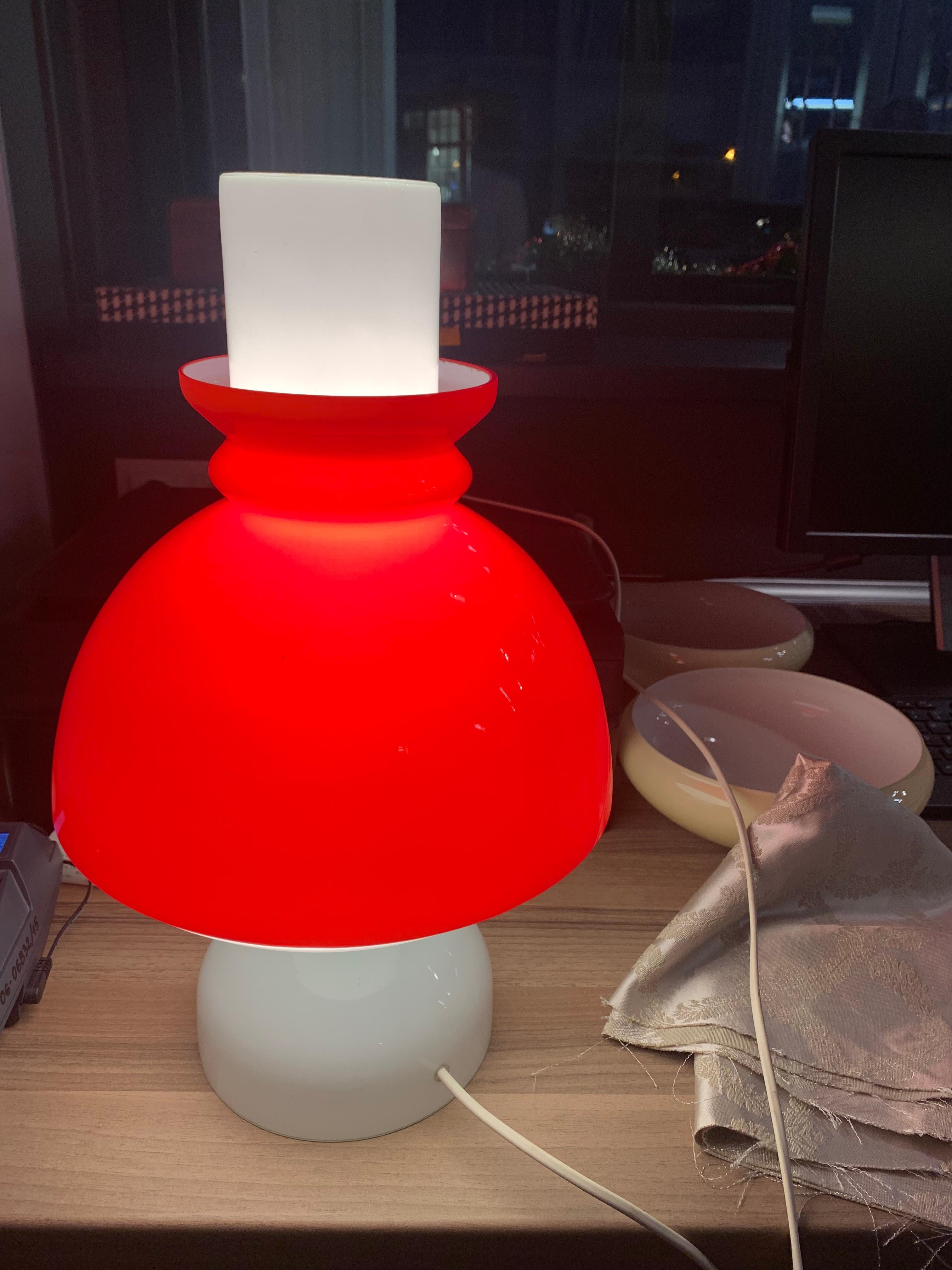 Glass table lamp produced in the Czech Republic in the 1960s.
Very good condition.
Measures: Height: 42cm. Diameter at its widest point: 25cm.