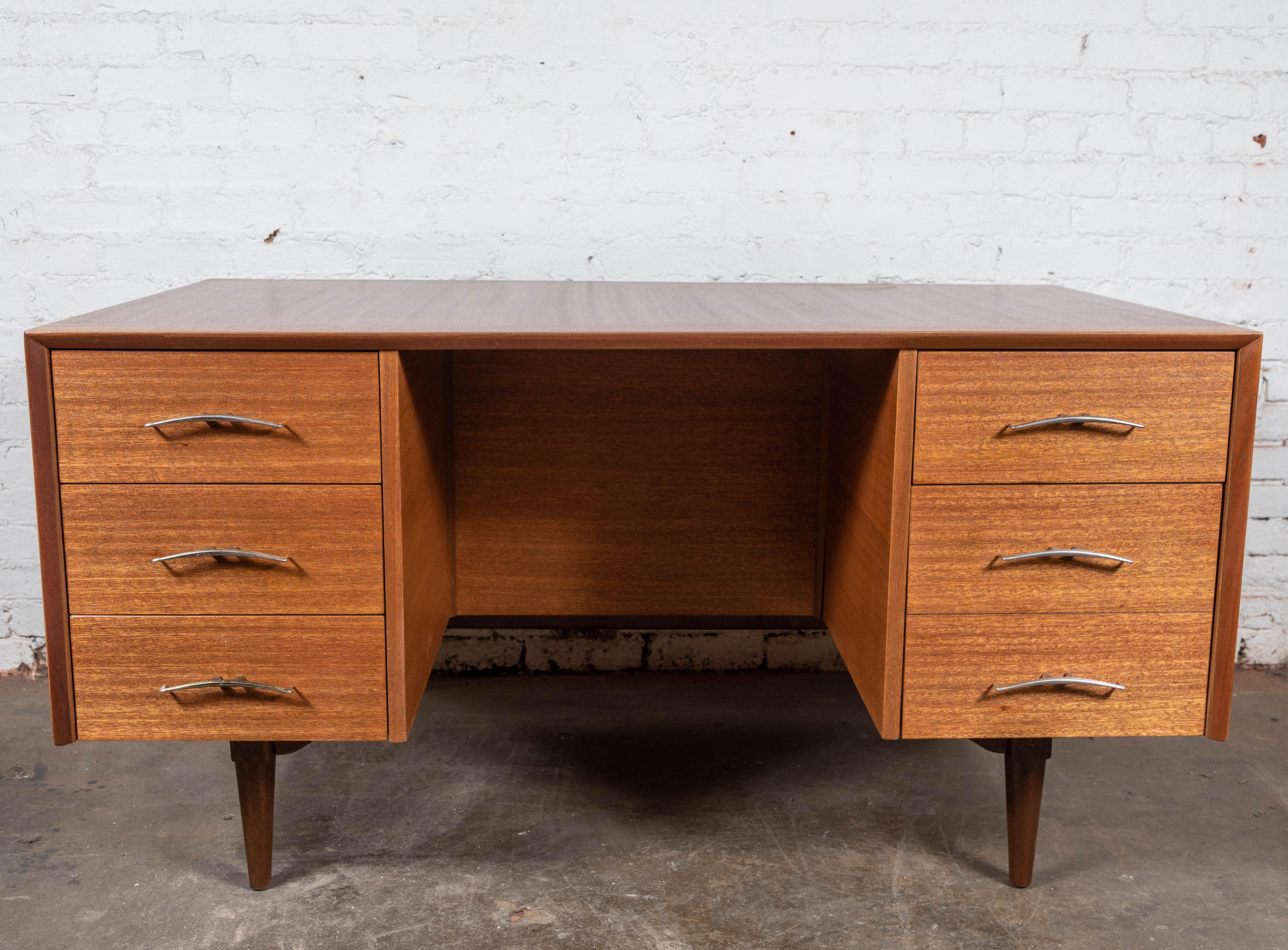 Newly refinished. Beautiful wood grain. Lots of storage in the back. Sliding doors, awesome brass handles by Brown Saltman.

Measures: W 54, D 30, H 29.