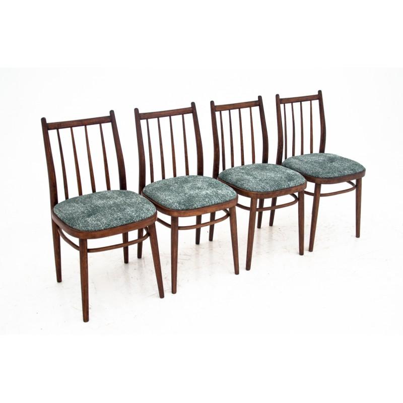 Set of 4 chairs made of walnut wood, upholstered with a new fabric. Chairs come from Poland, from circa 1950s.
Perfect condition after wood renovation.
Stabile and comfortable.