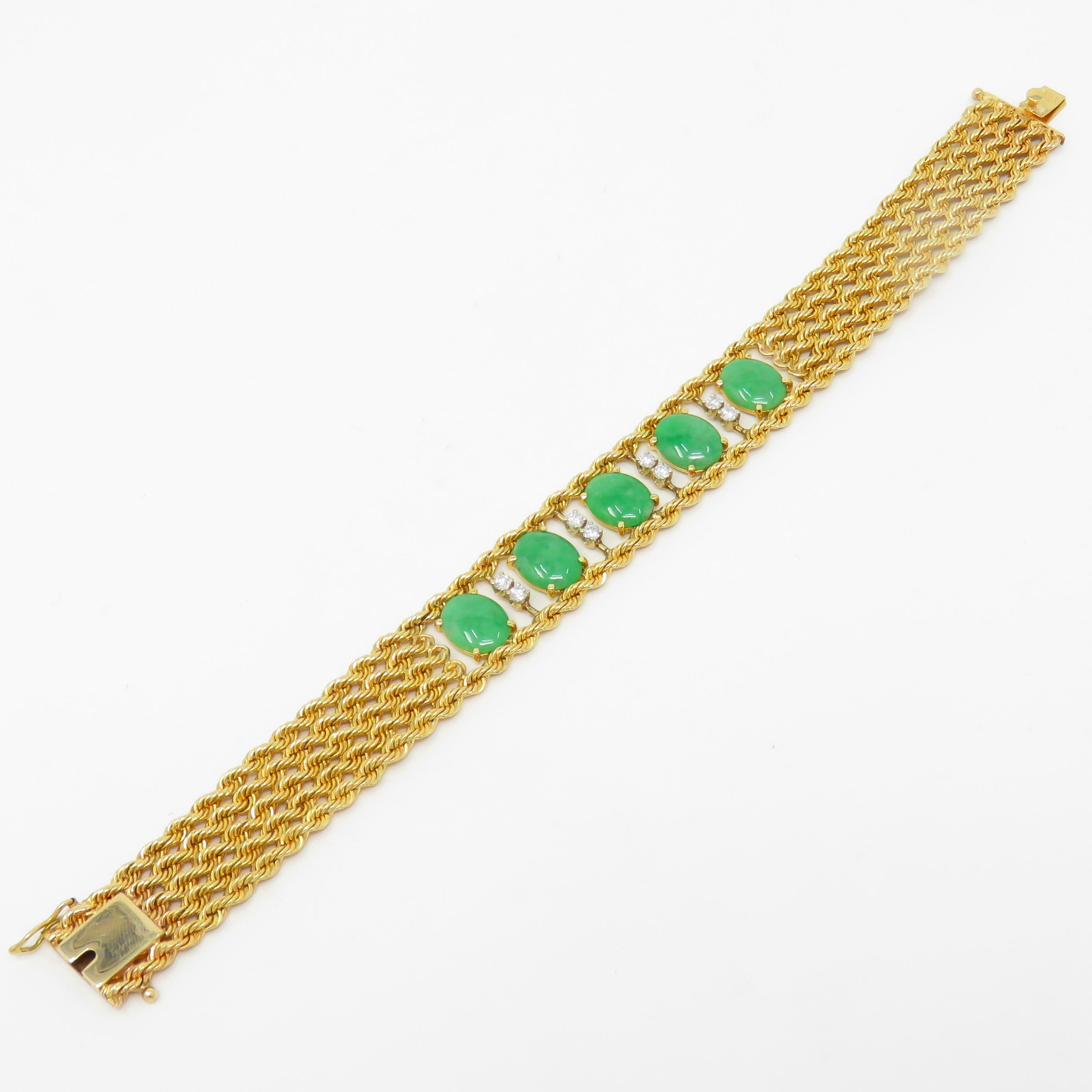 This stunning jade bracelet features five beautiful jade jadeite gemstones on a thick 14k gold bracelet also set with 8 natural tested diamonds, totaling approximately 0.50 carats, most in the G-H color range and VS clarity range.

The bracelet also