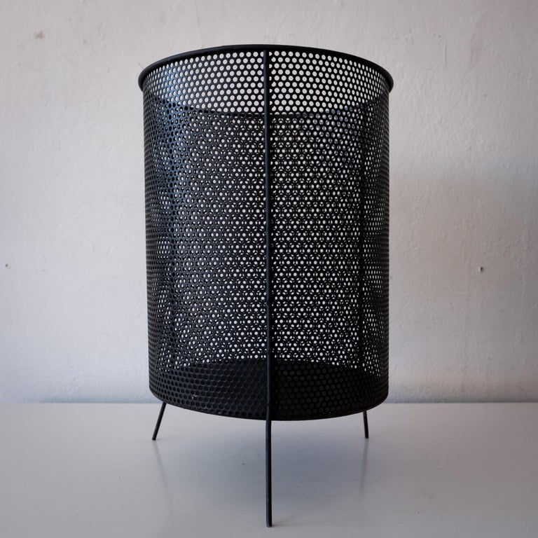 Mid Century Richard Galef for Ravenware perforated metal trash can. Modernist three leg design. Distributed by Raymor. USA, 1950s

One of two available.