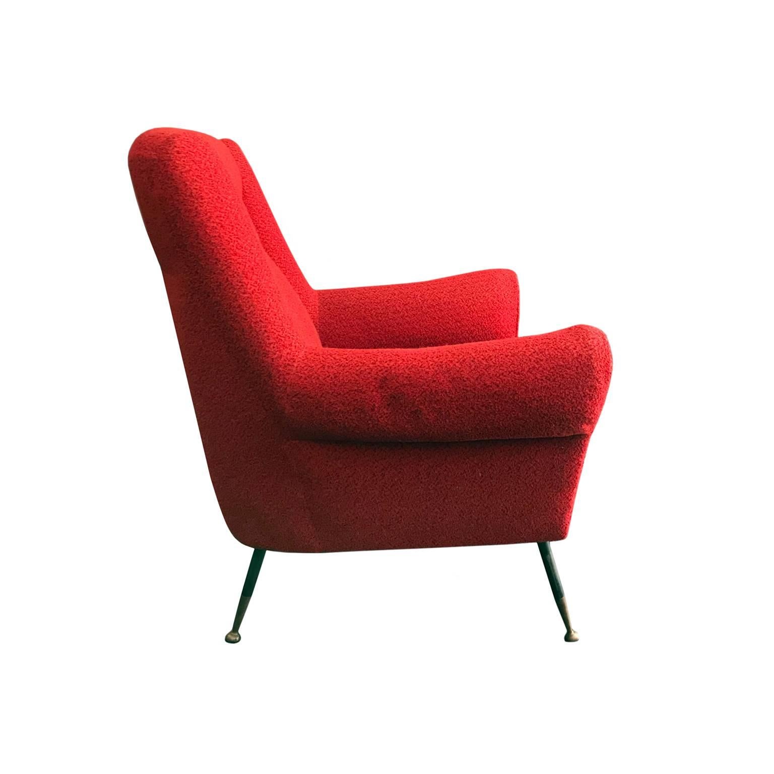 Midcentury rolled armchair in original red boucle with iron legs and brass sabots, Italy, 1950s.

Pair available, priced individually.
