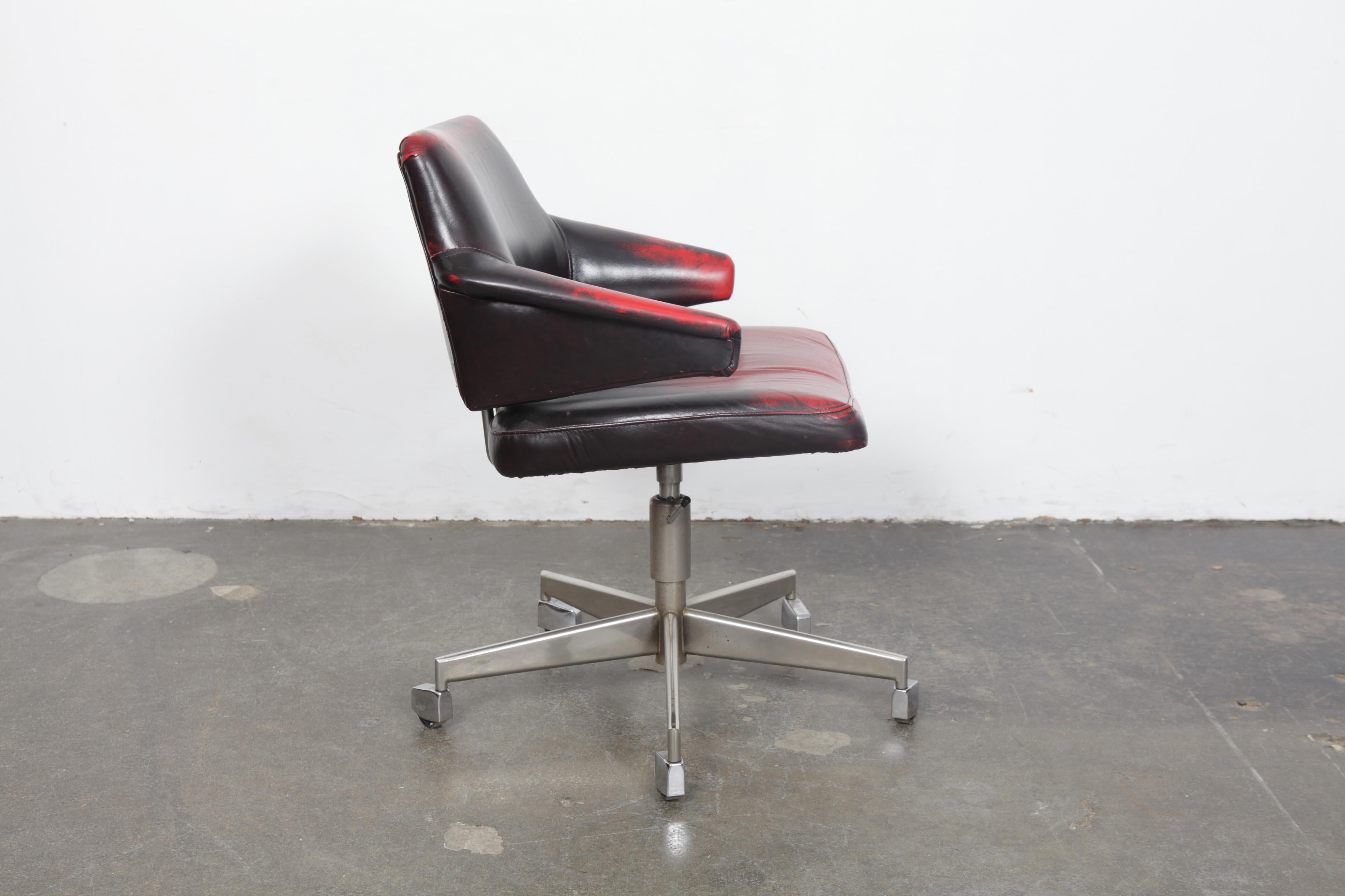 Danish Mid-Century Modern office chair, produced by Duba, 1960s. Leather is not original but is also not new, showing wonderful signs of patina and mixed color tones.