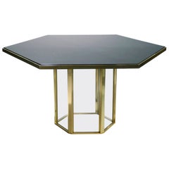 Mesa de comedor Romeo Rega de mediados de siglo, laca negra, latón y cristal, años 70