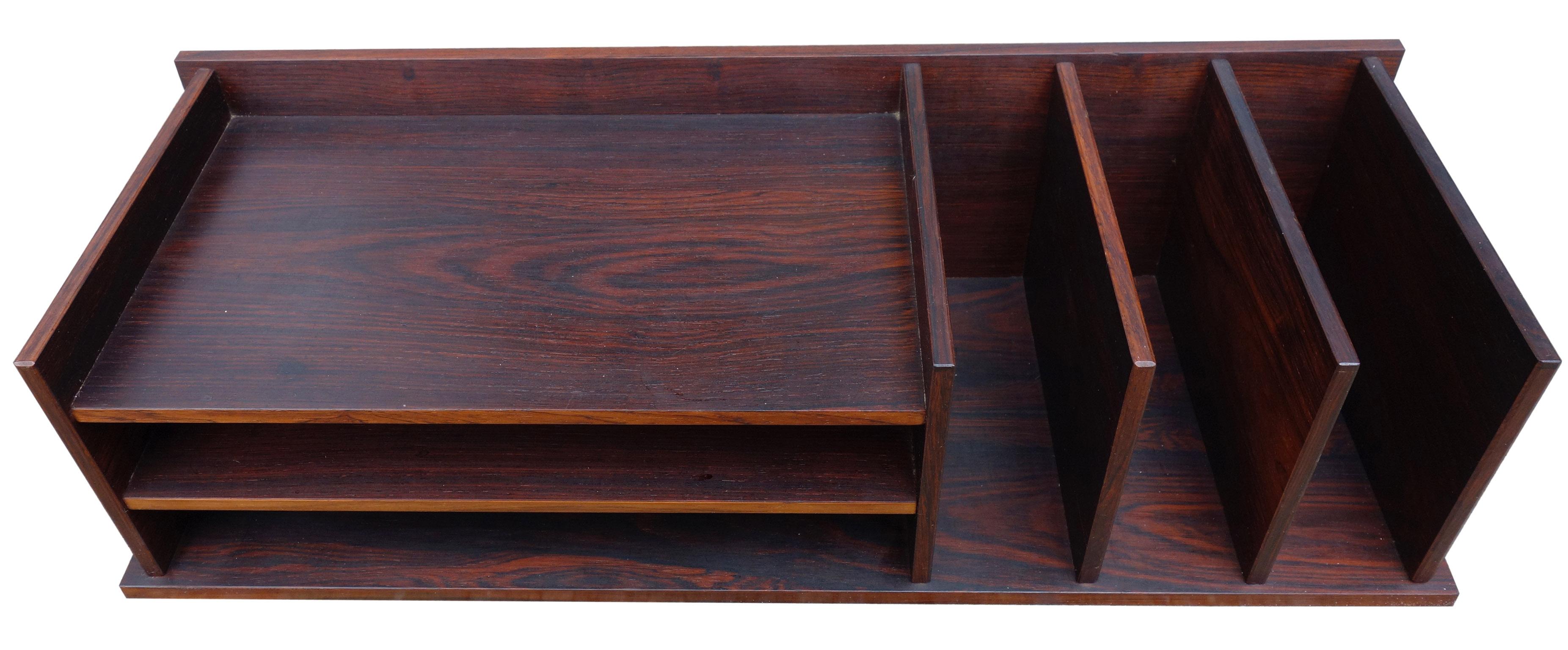 Wonderful addition to your midcentury Scandinavian office. Solid rosewood construction.