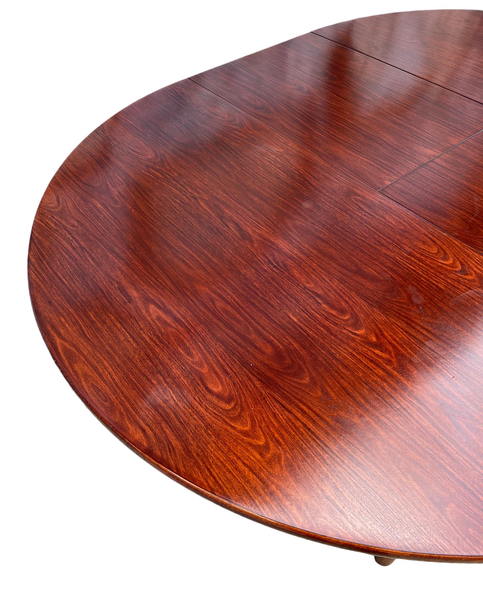 Mid-20th Century Midcentury Rosewood Expandable Round Dining Table with 1 Nesting Leaf
