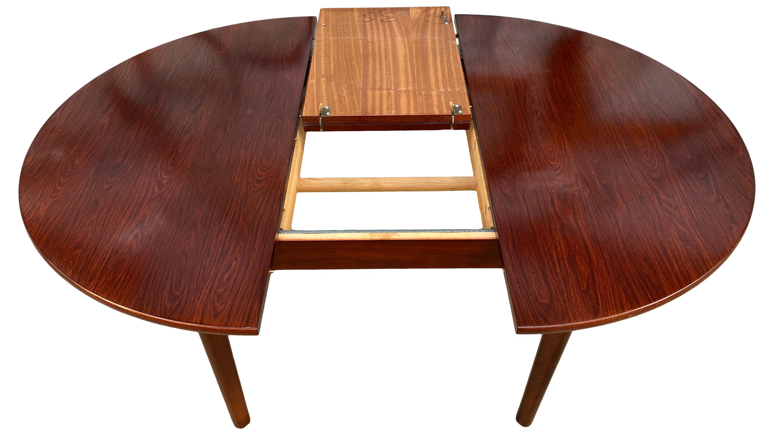 Midcentury Rosewood Expandable Round Dining Table with 1 Nesting Leaf 1